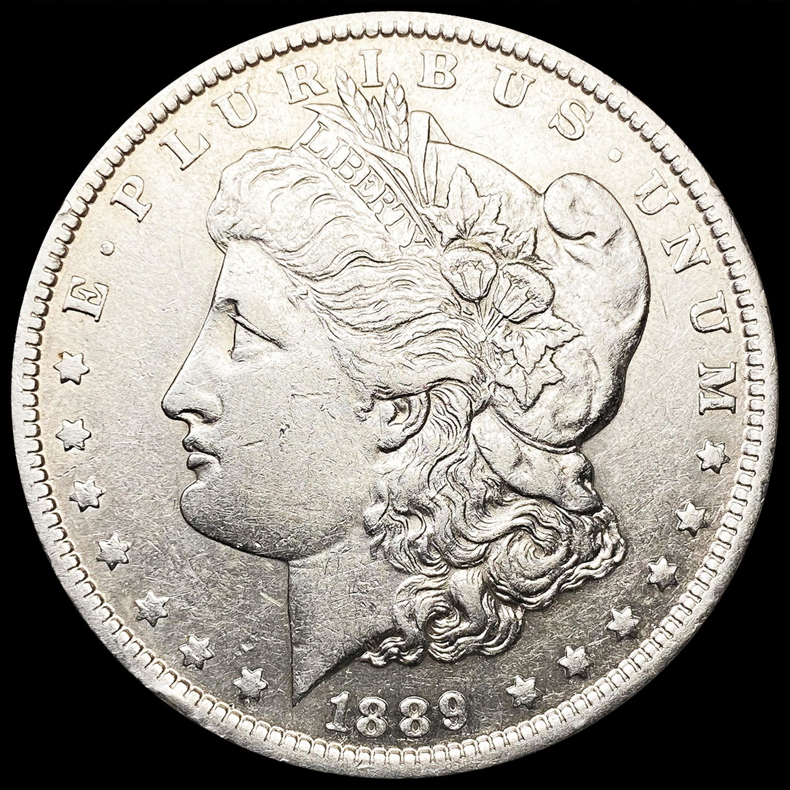 1889-O Morgan Silver Dollar CLOSELY UNCIRCULATED (1 of 2)