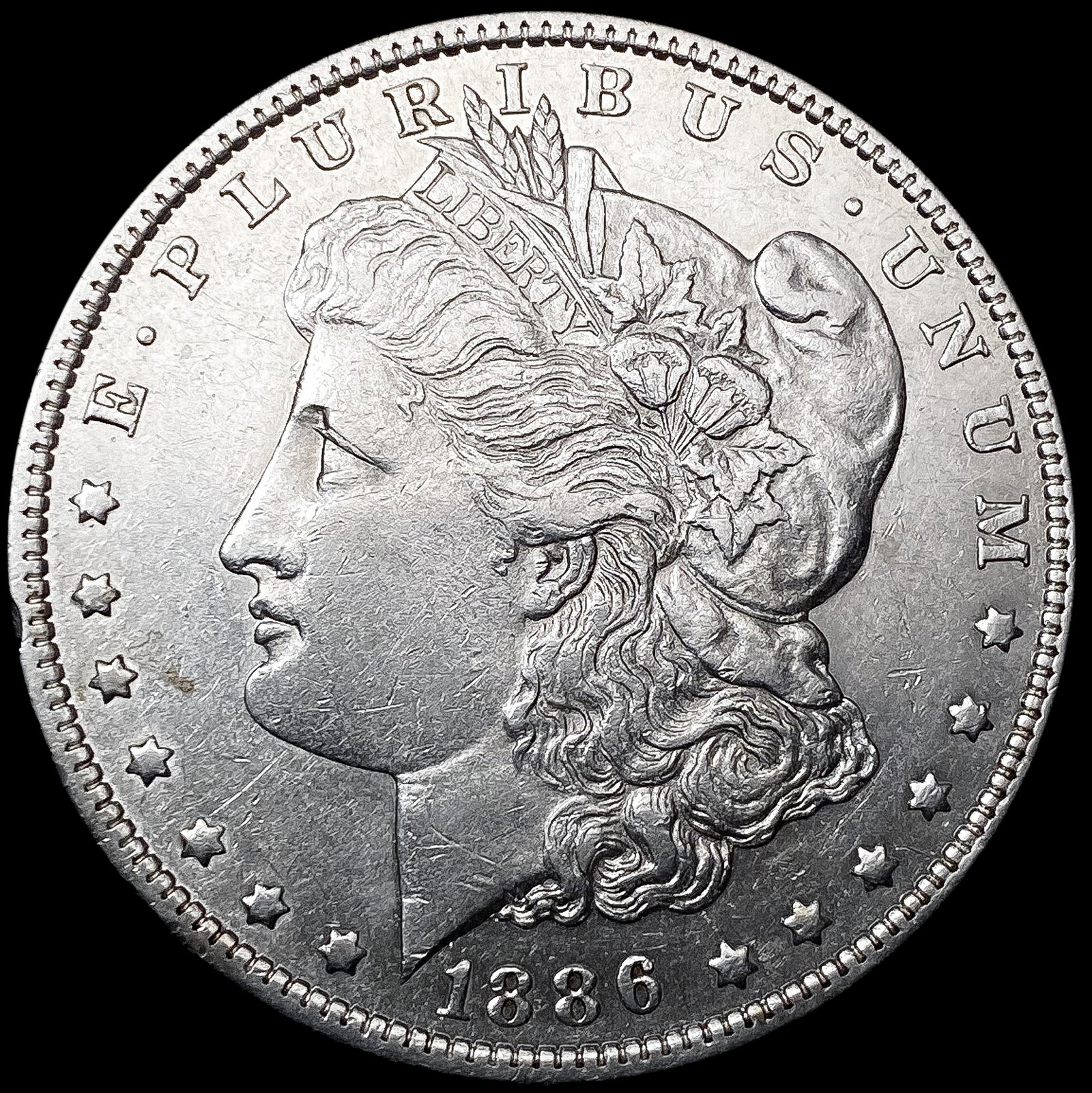 1886-O Morgan Silver Dollar CLOSELY UNCIRCULATED (1 of 2)