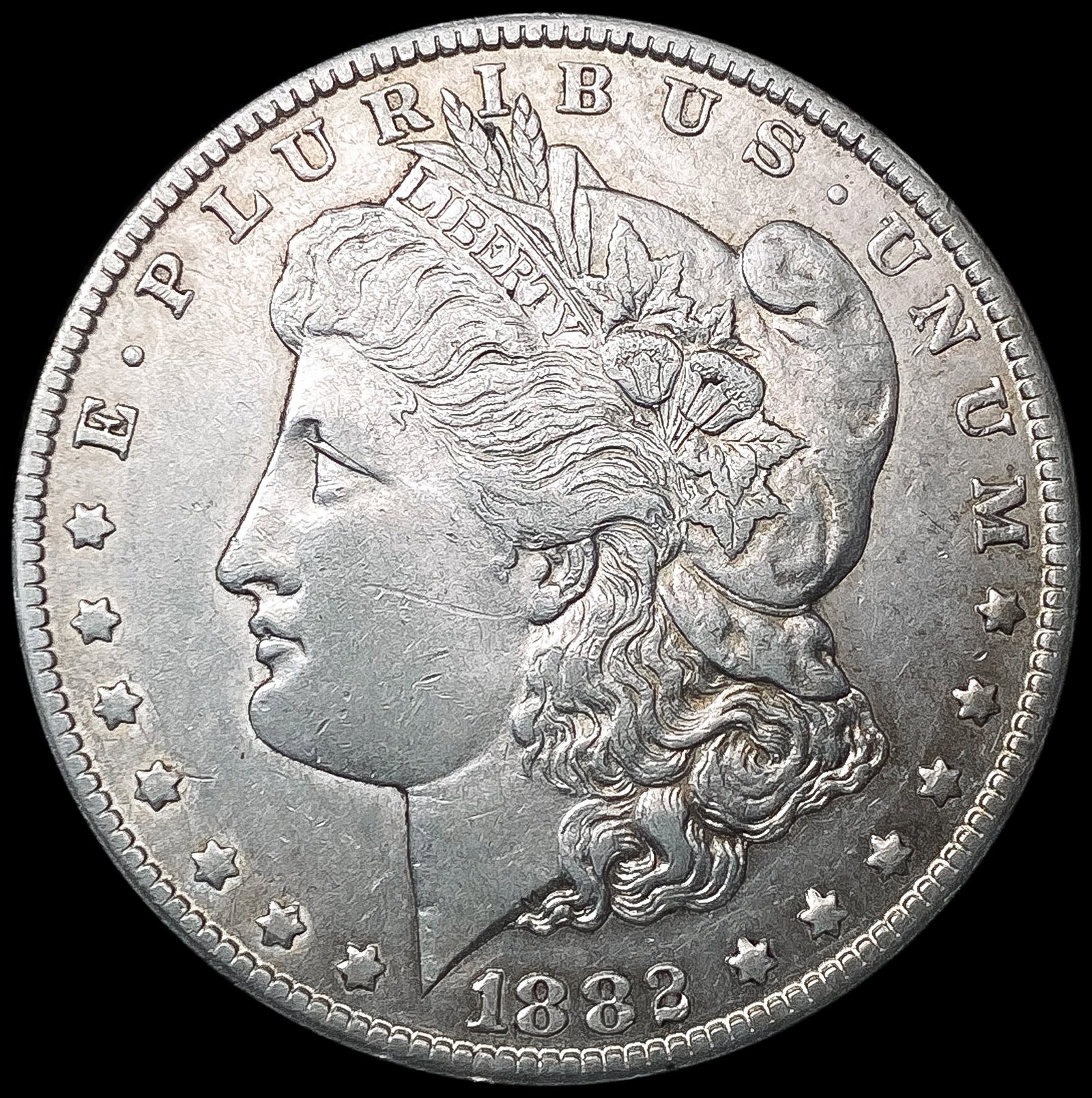 1882-CC Morgan Silver Dollar CLOSELY UNCIRCULATED (1 of 2)