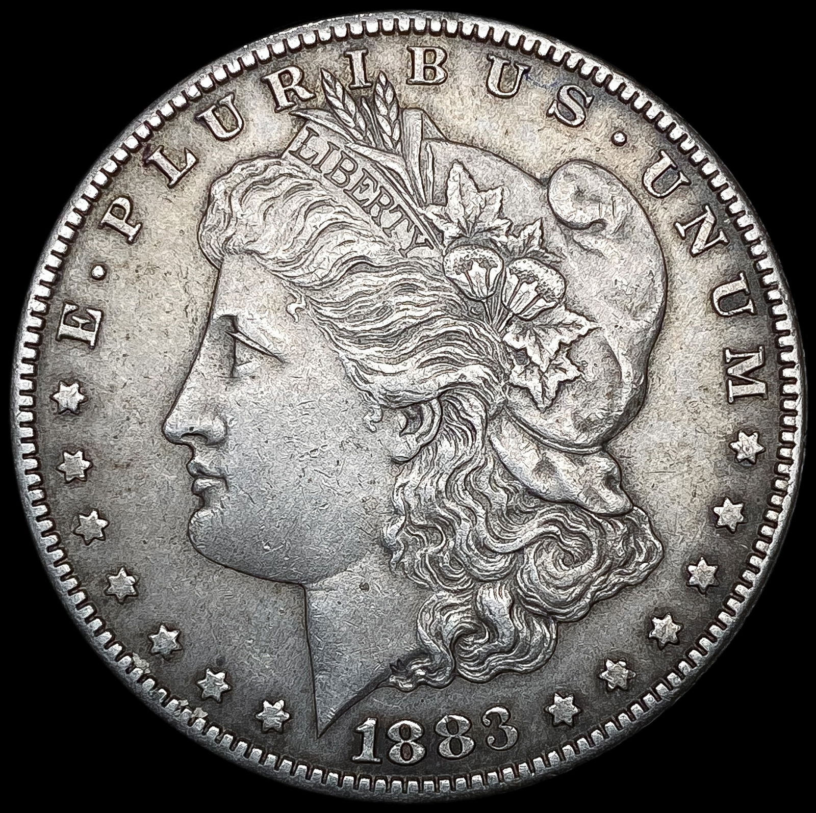 1883-CC Morgan Silver Dollar CLOSELY UNCIRCULATED (1 of 2)
