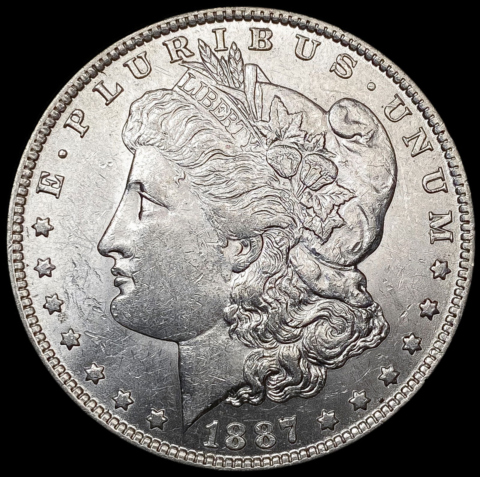 1887-O Morgan Silver Dollar CLOSELY UNCIRCULATED (1 of 2)