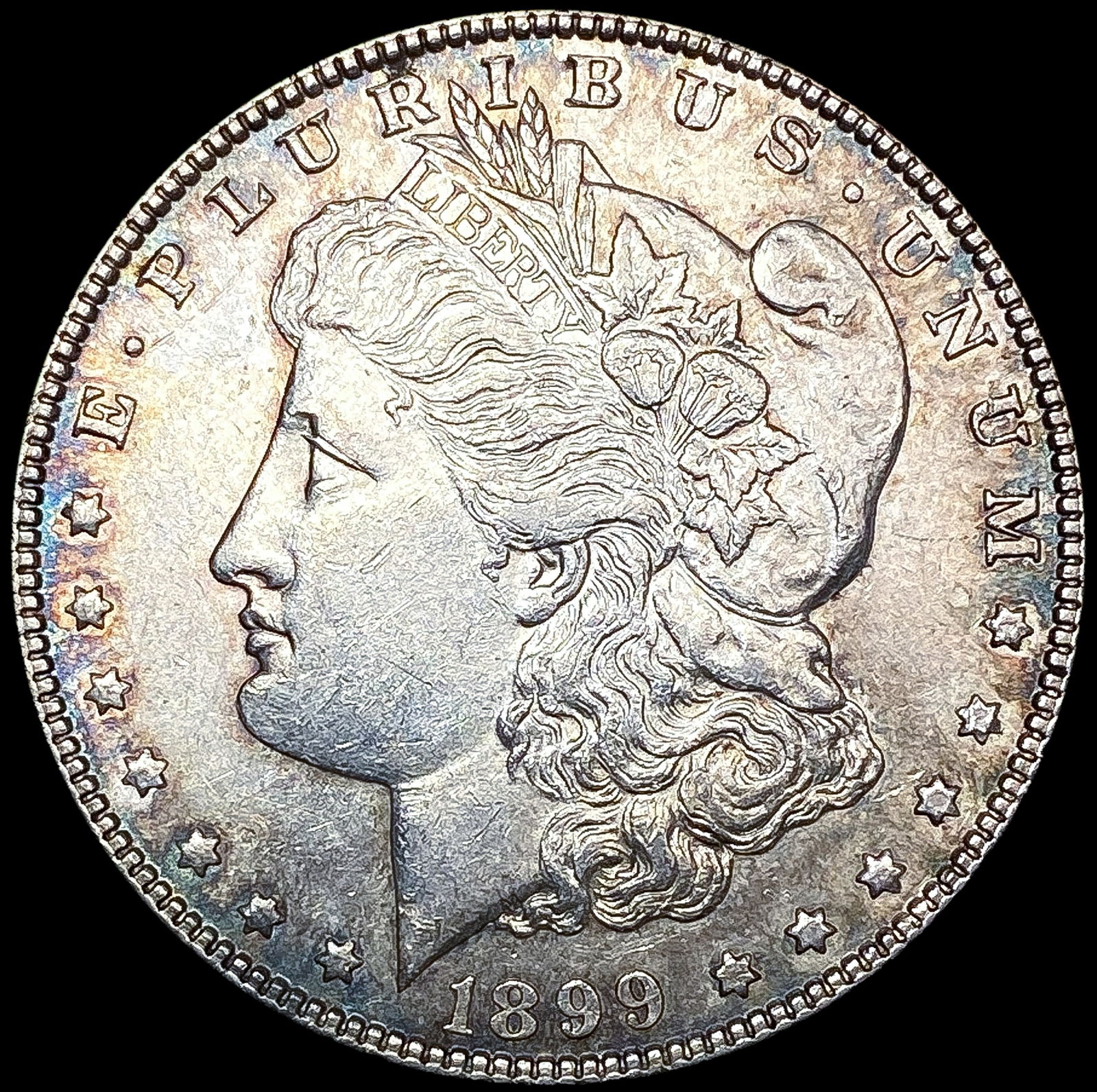 1899 Morgan Silver Dollar CLOSELY UNCIRCULATED (1 of 2)