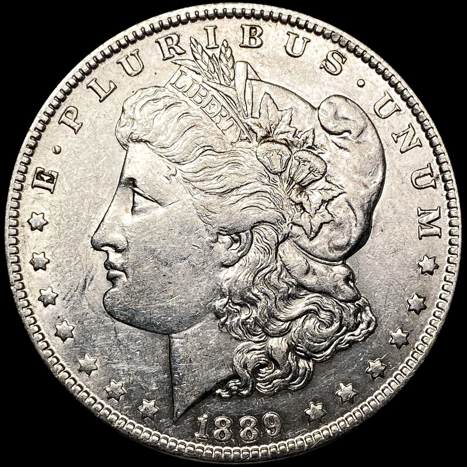 1889-O Morgan Silver Dollar CLOSELY UNCIRCULATED (1 of 2)