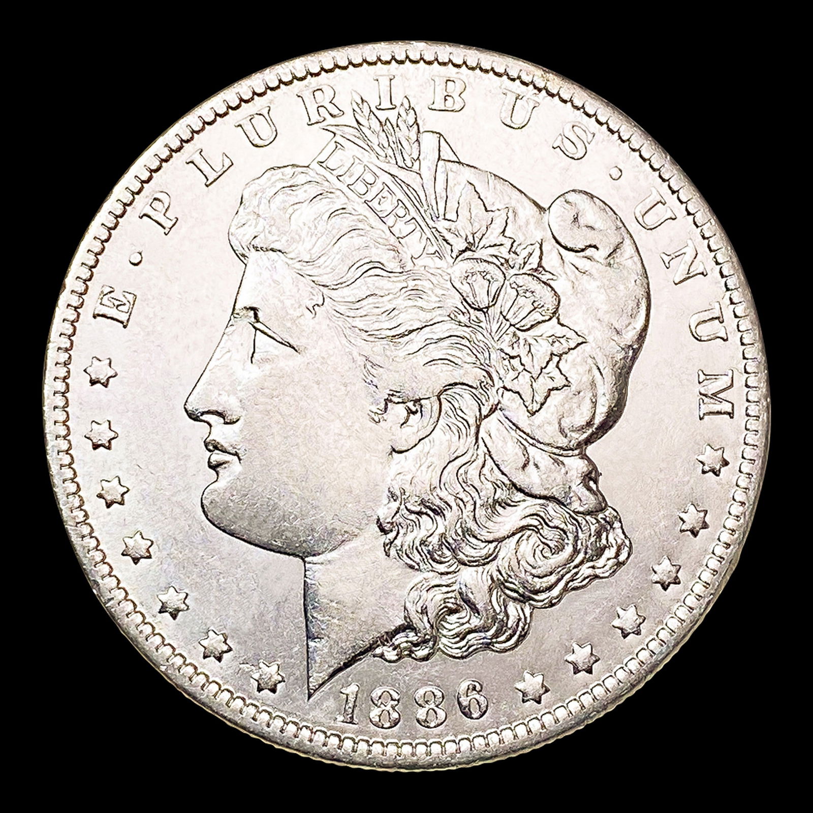 1886-O Morgan Silver Dollar NEARLY UNCIRCULATED (1 of 2)