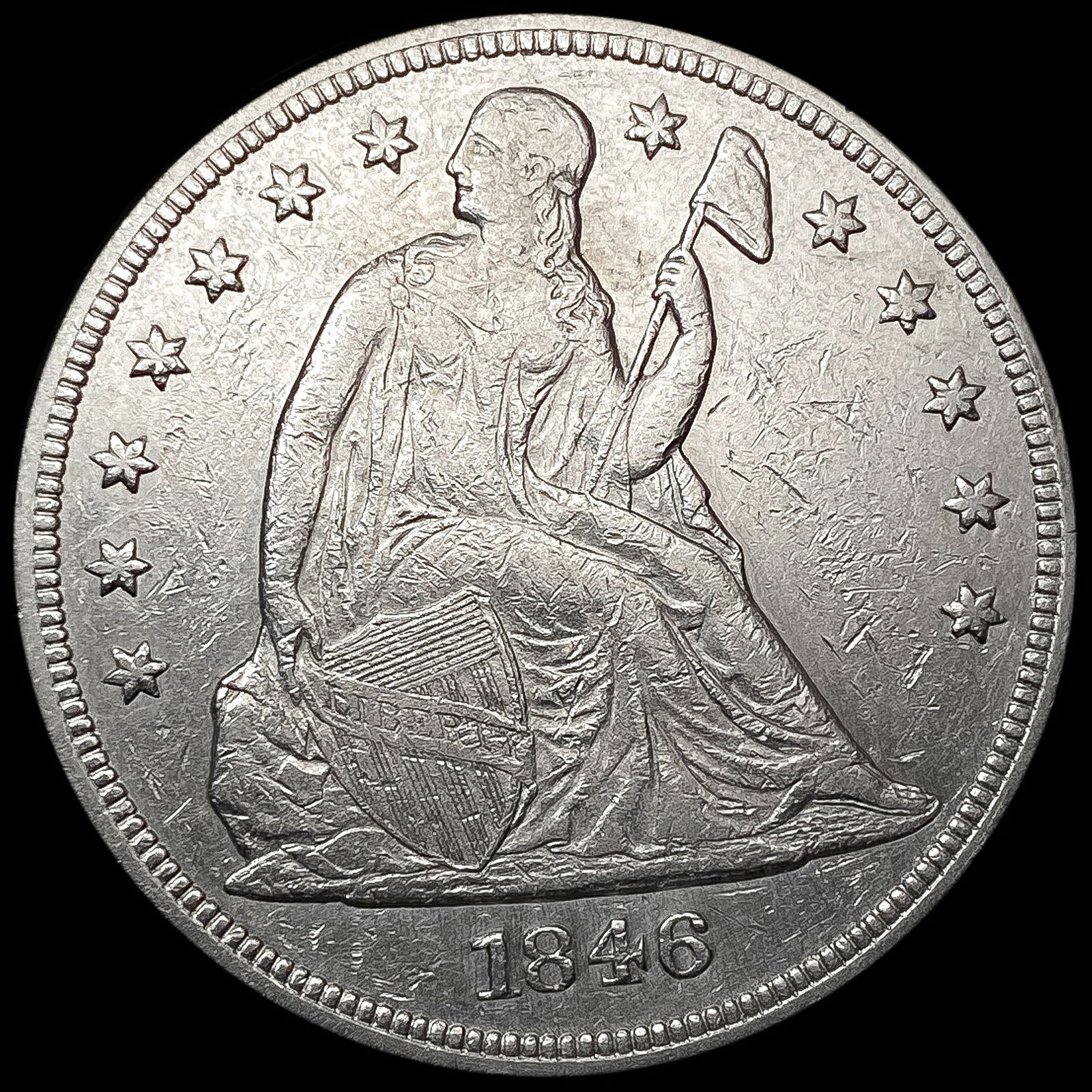 1846 Seated Liberty Dollar NEARLY UNCIRCULATED (1 of 2)