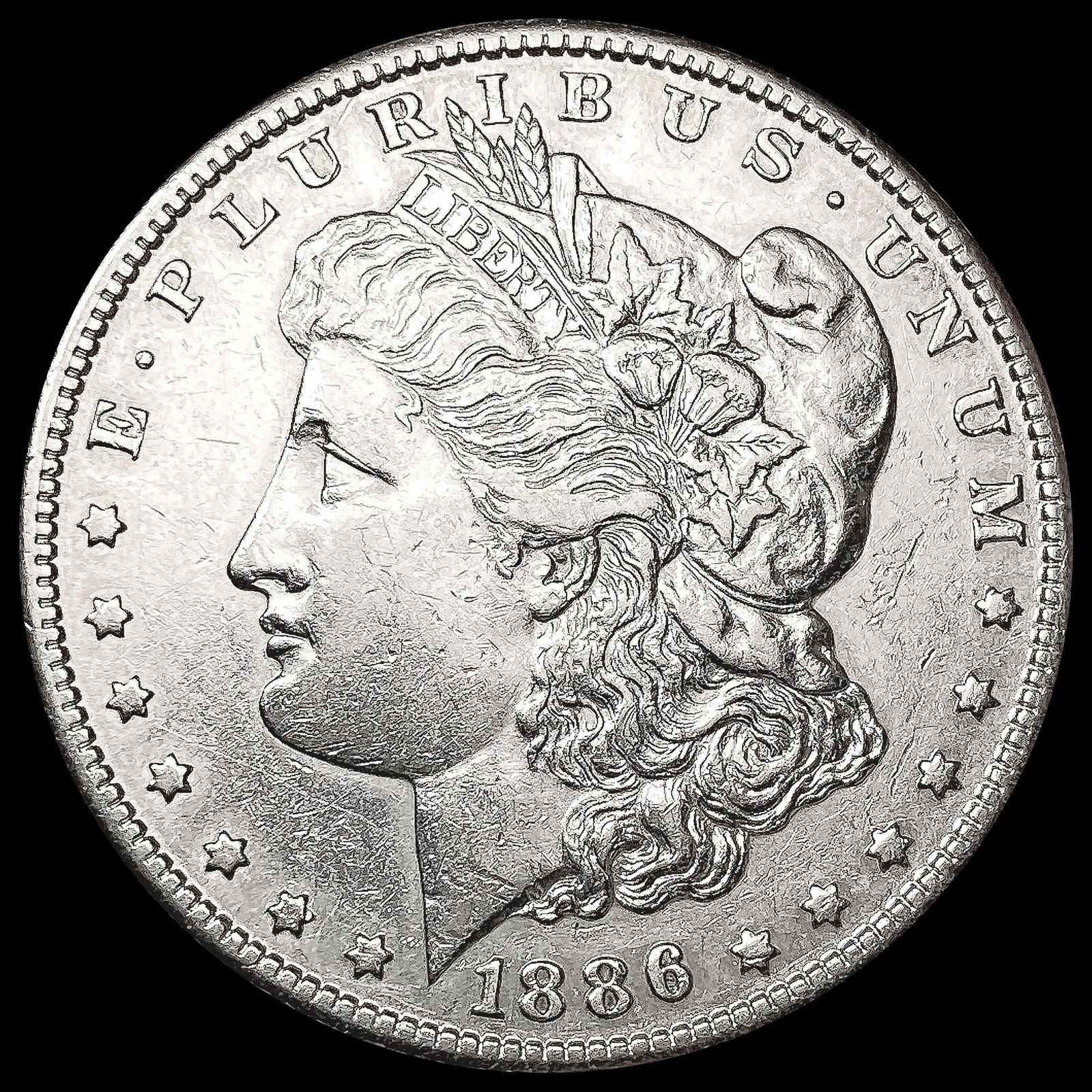 1886-S Morgan Silver Dollar CLOSELY UNCIRCULATED (1 of 2)