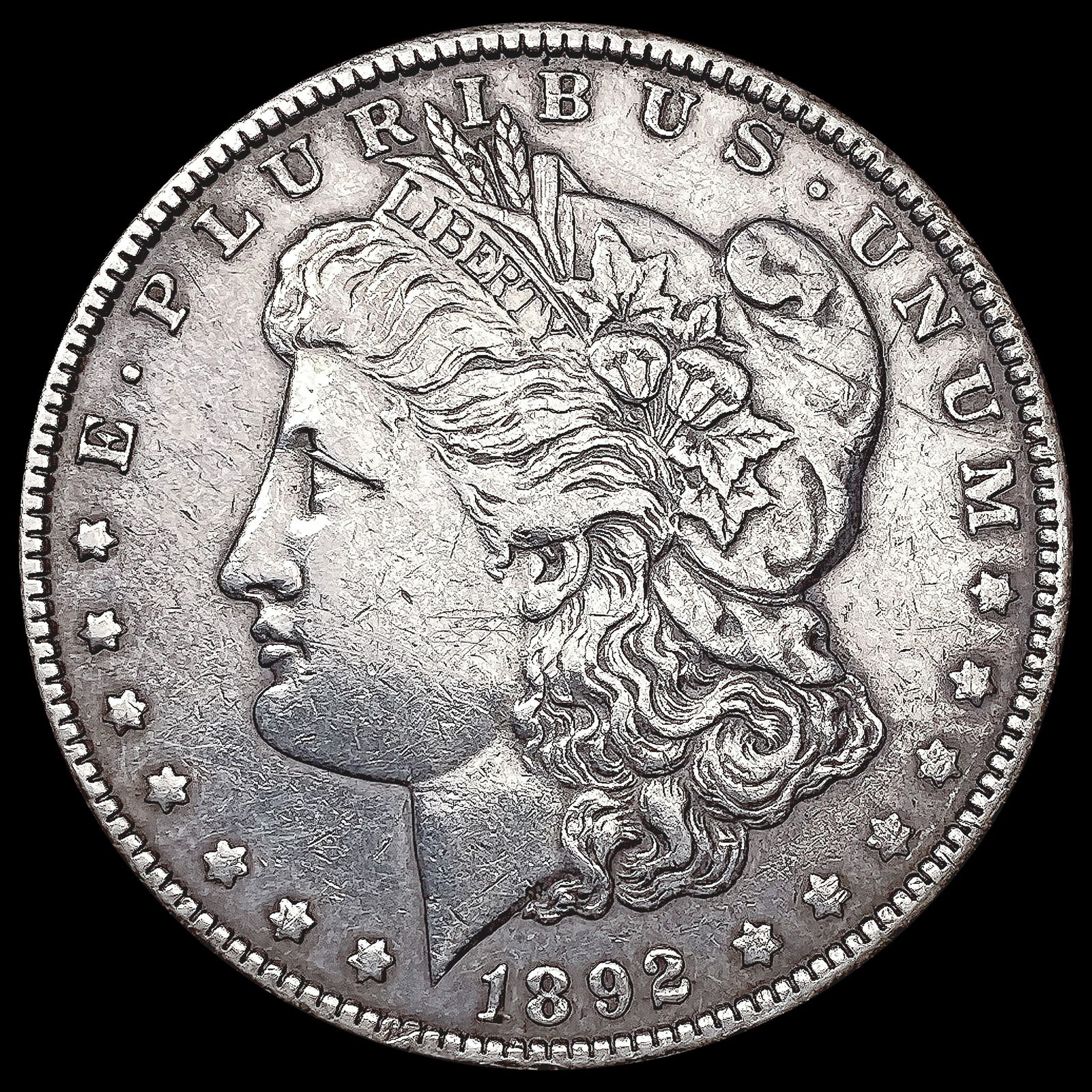 1892-O Morgan Silver Dollar NEARLY UNCIRCULATED (1 of 2)