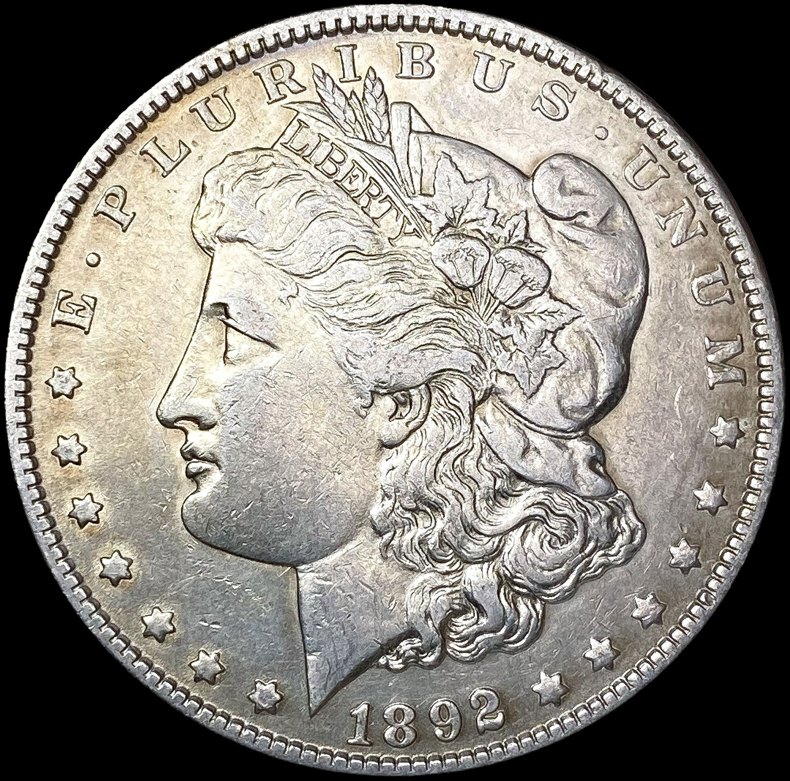 1892-O Morgan Silver Dollar NEARLY UNCIRCULATED (1 of 2)