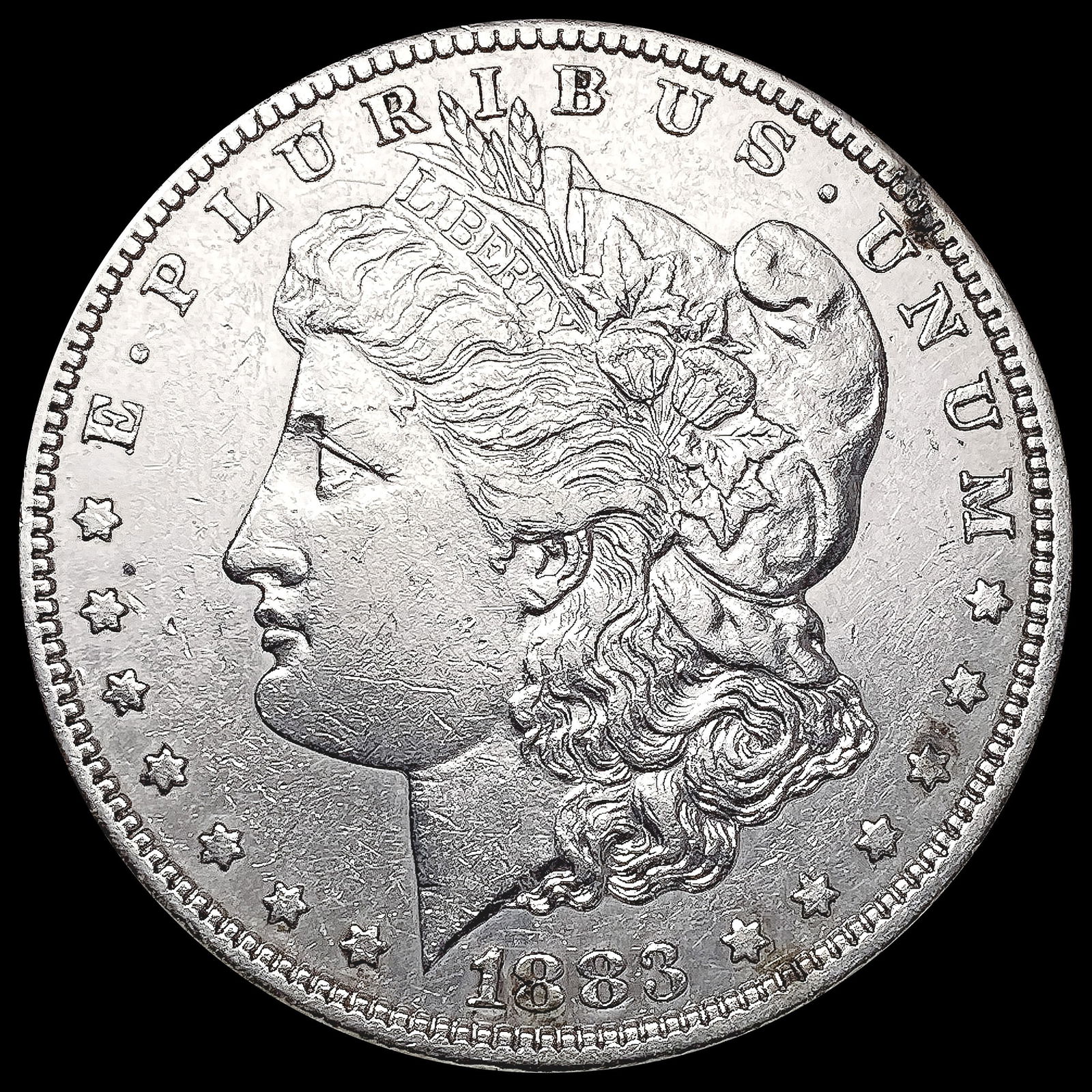 1883-S Morgan Silver Dollar NEARLY UNCIRCULATED (1 of 2)