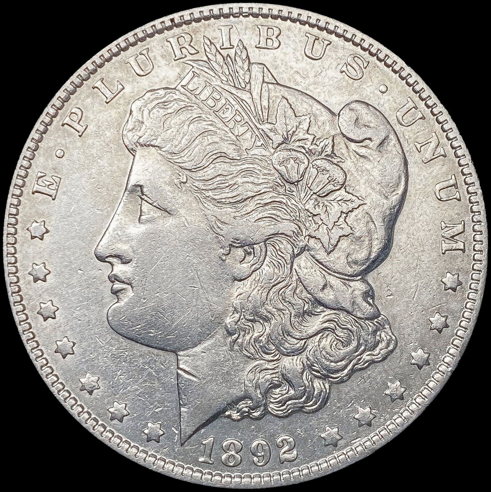 1892-O Morgan Silver Dollar NEARLY UNCIRCULATED (1 of 2)