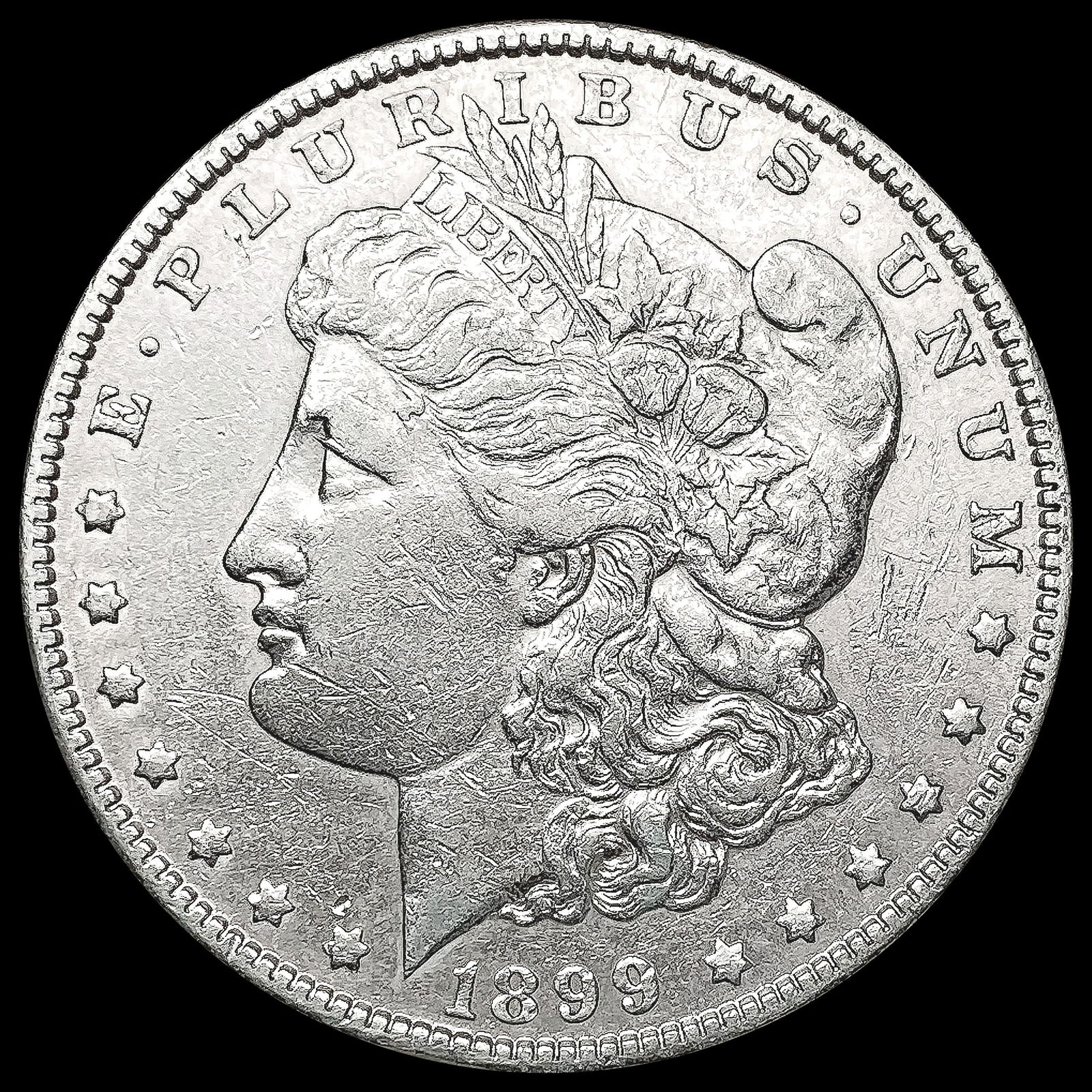 1899 Morgan Silver Dollar CLOSELY UNCIRCULATED (1 of 2)