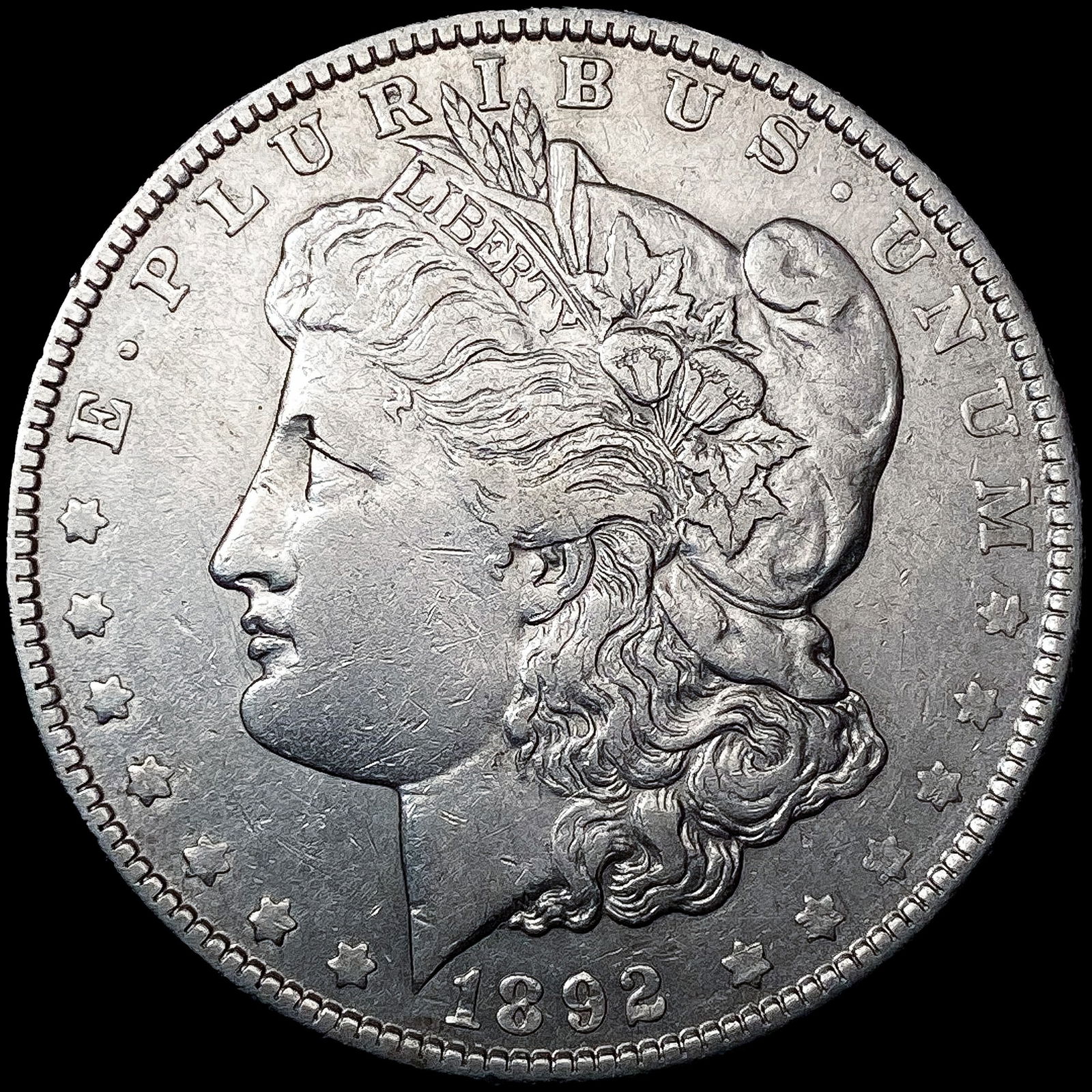 1892-O Morgan Silver Dollar NEARLY UNCIRCULATED (1 of 2)