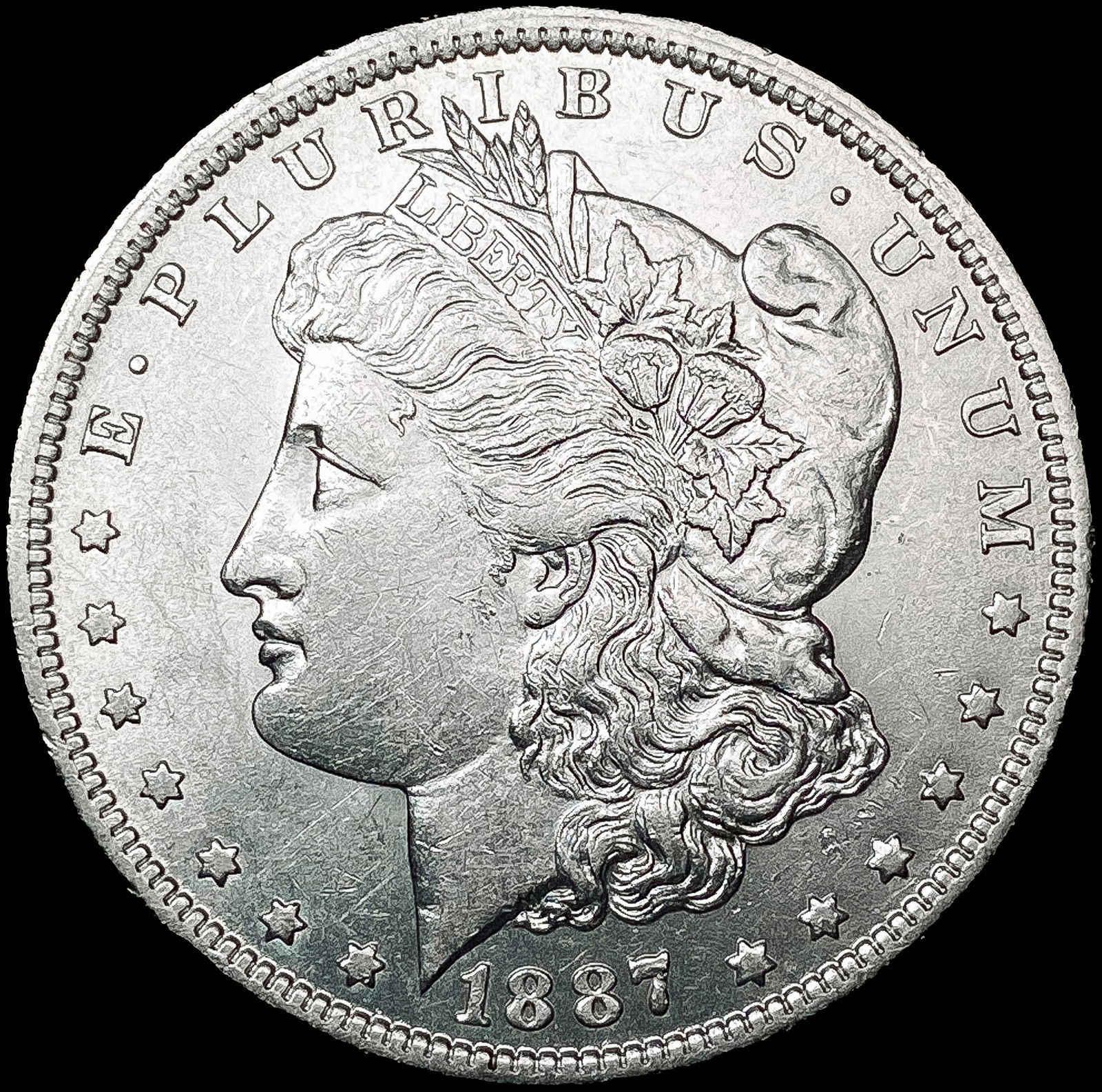 1887-O Morgan Silver Dollar CLOSELY UNCIRCULATED (1 of 2)