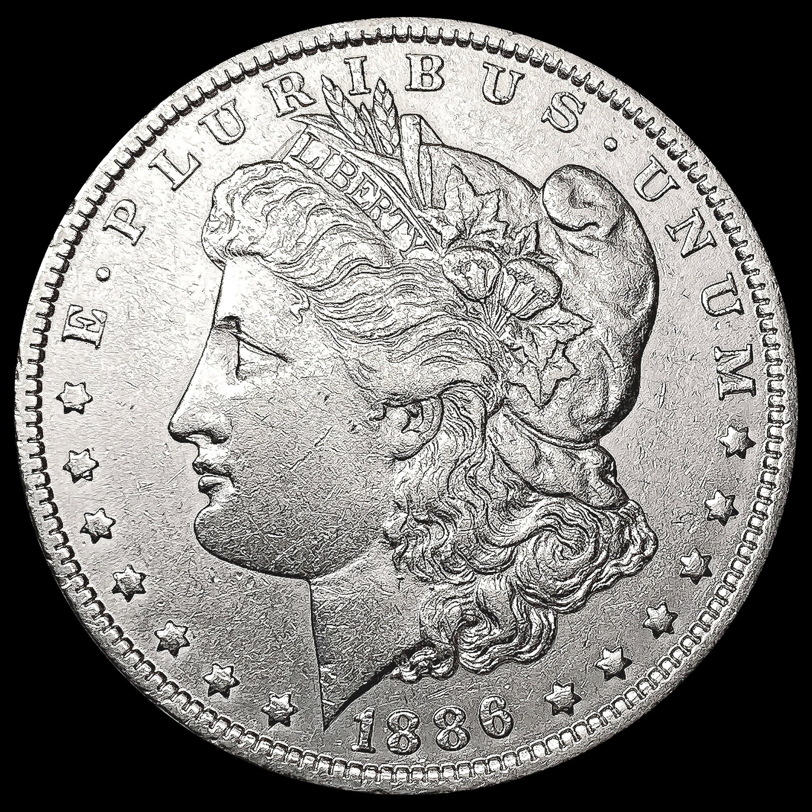 1886-O Morgan Silver Dollar CLOSELY UNCIRCULATED (1 of 2)