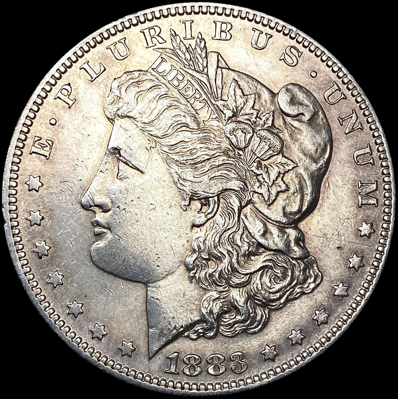 1883-S Morgan Silver Dollar CLOSELY UNCIRCULATED (1 of 2)