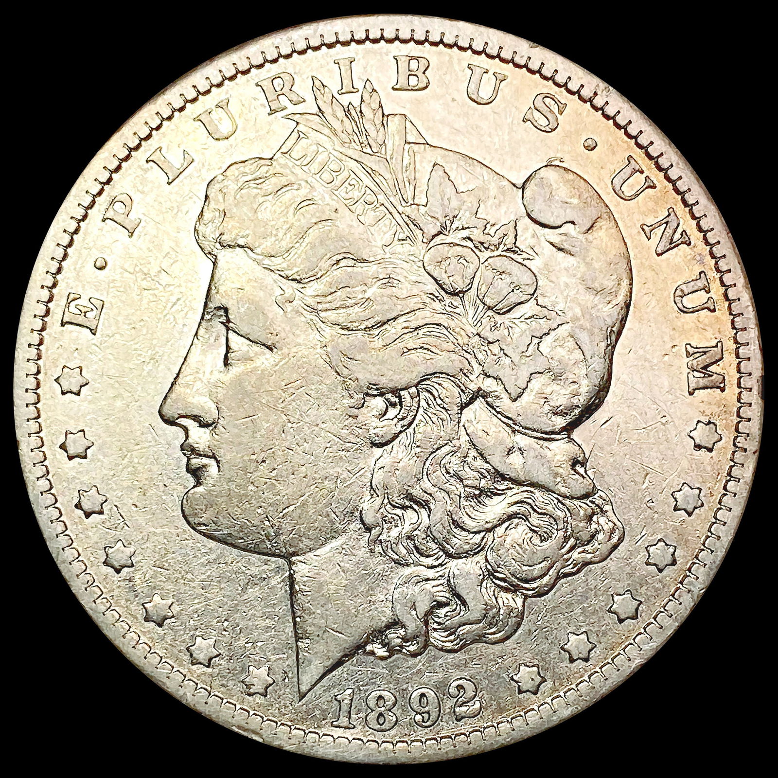 1892-CC Morgan Silver Dollar NEARLY UNCIRCULATED (1 of 2)