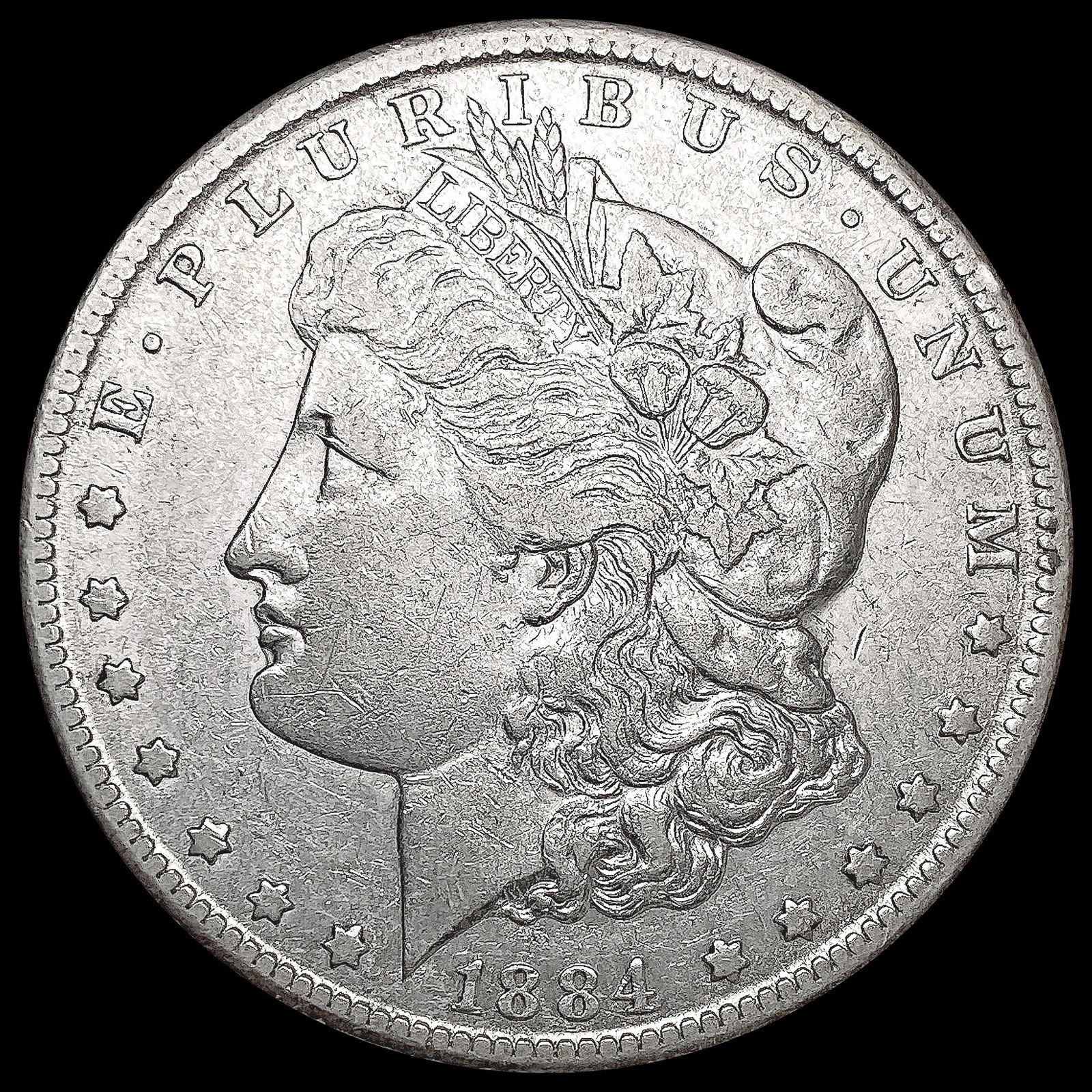 1884-CC Morgan Silver Dollar CLOSELY UNCIRCULATED (1 of 2)