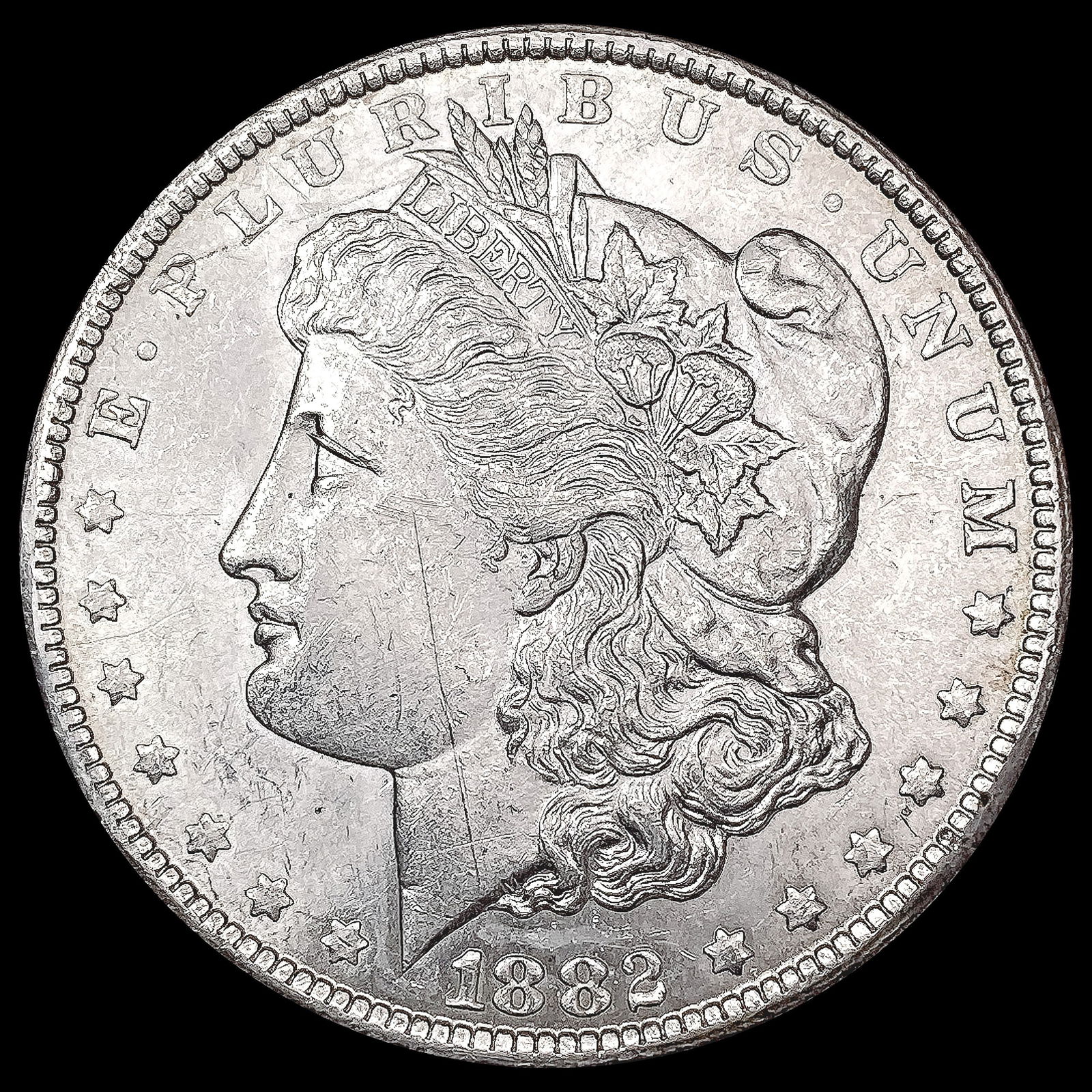 1882-CC Morgan Silver Dollar CLOSELY UNCIRCULATED (1 of 2)