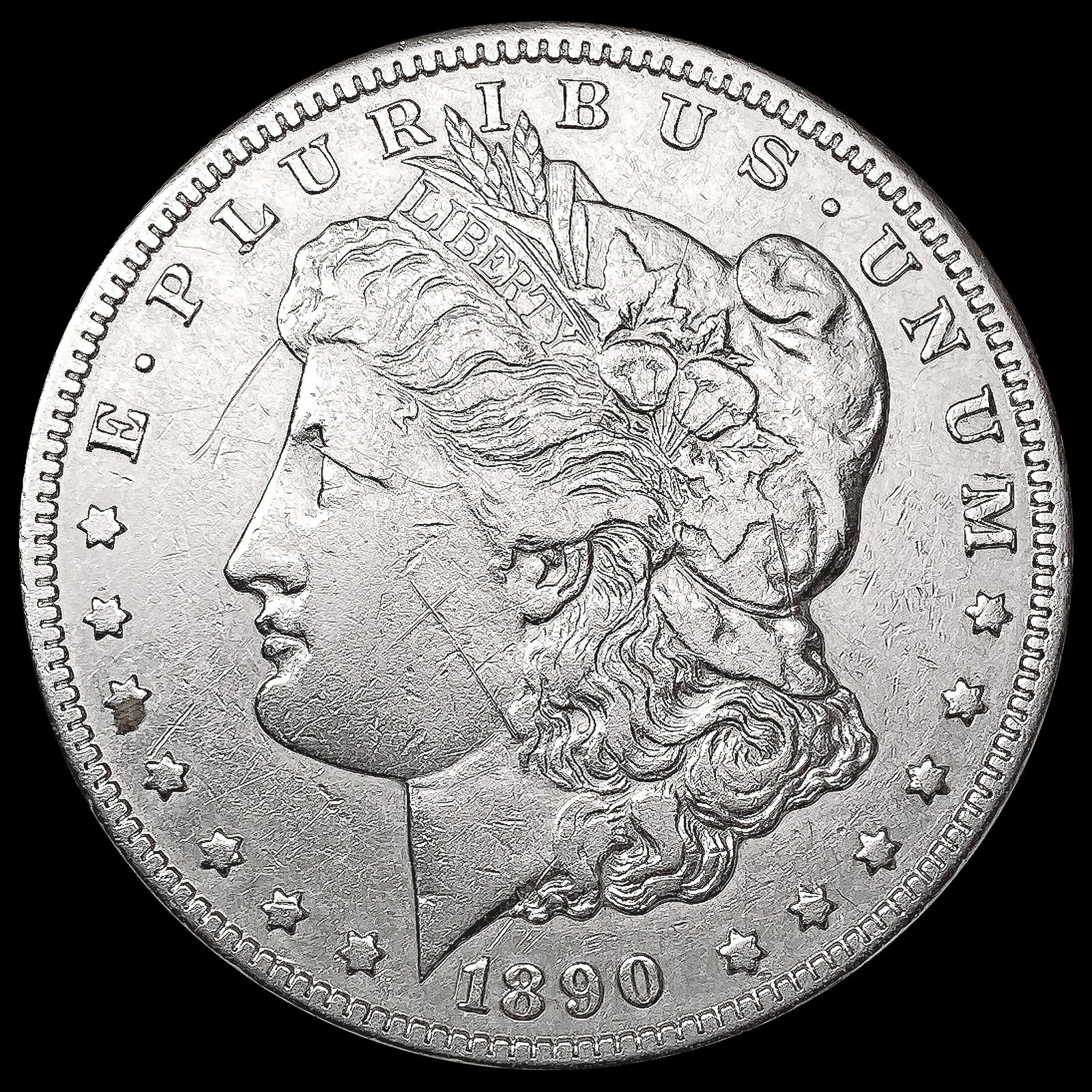 1890-CC Morgan Silver Dollar NEARLY UNCIRCULATED (1 of 2)