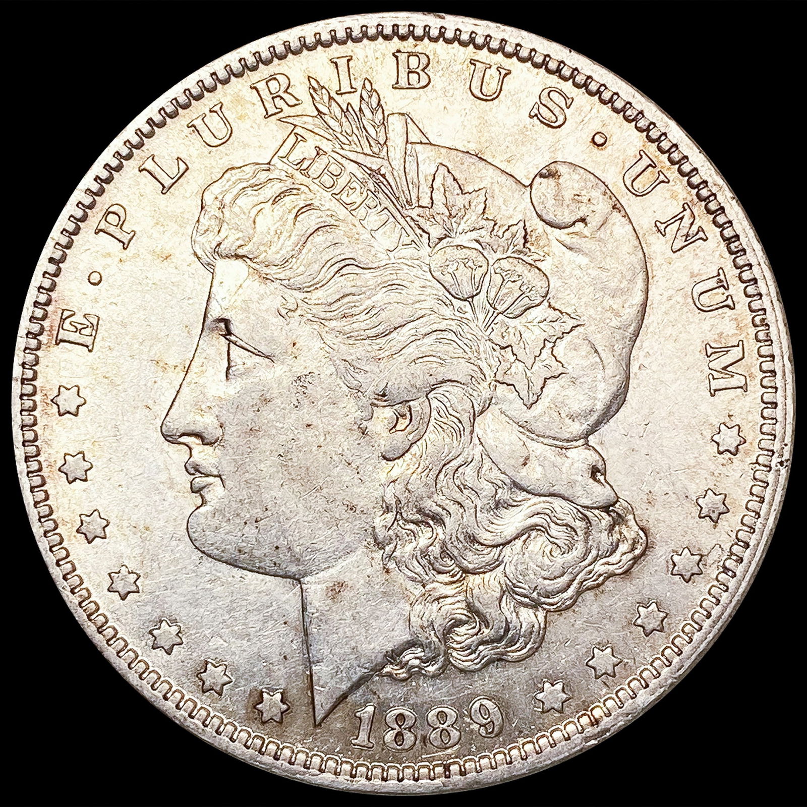 1889-O Morgan Silver Dollar NEARLY UNCIRCULATED (1 of 2)