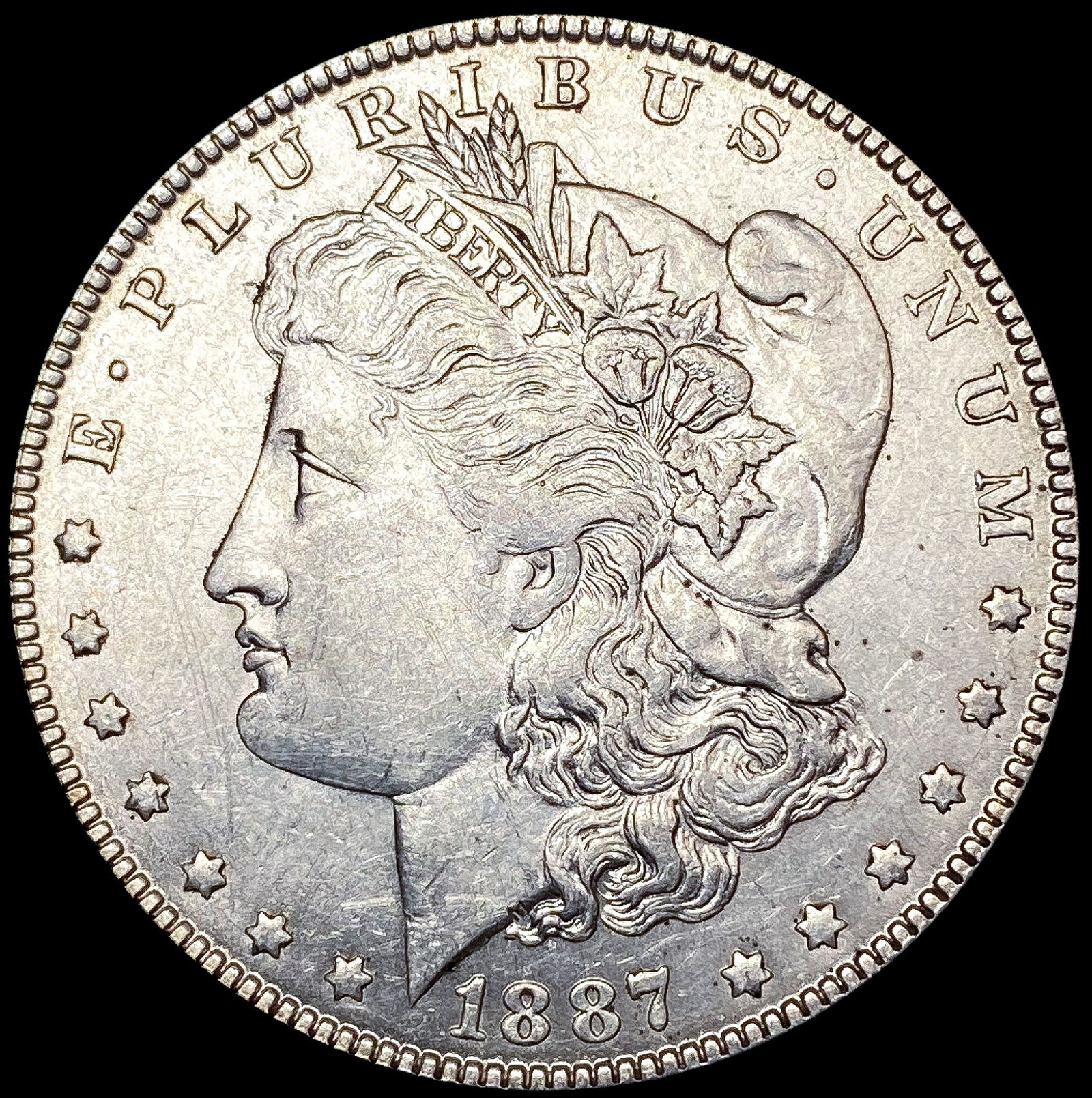 1887-O Morgan Silver Dollar CLOSELY UNCIRCULATED (1 of 2)
