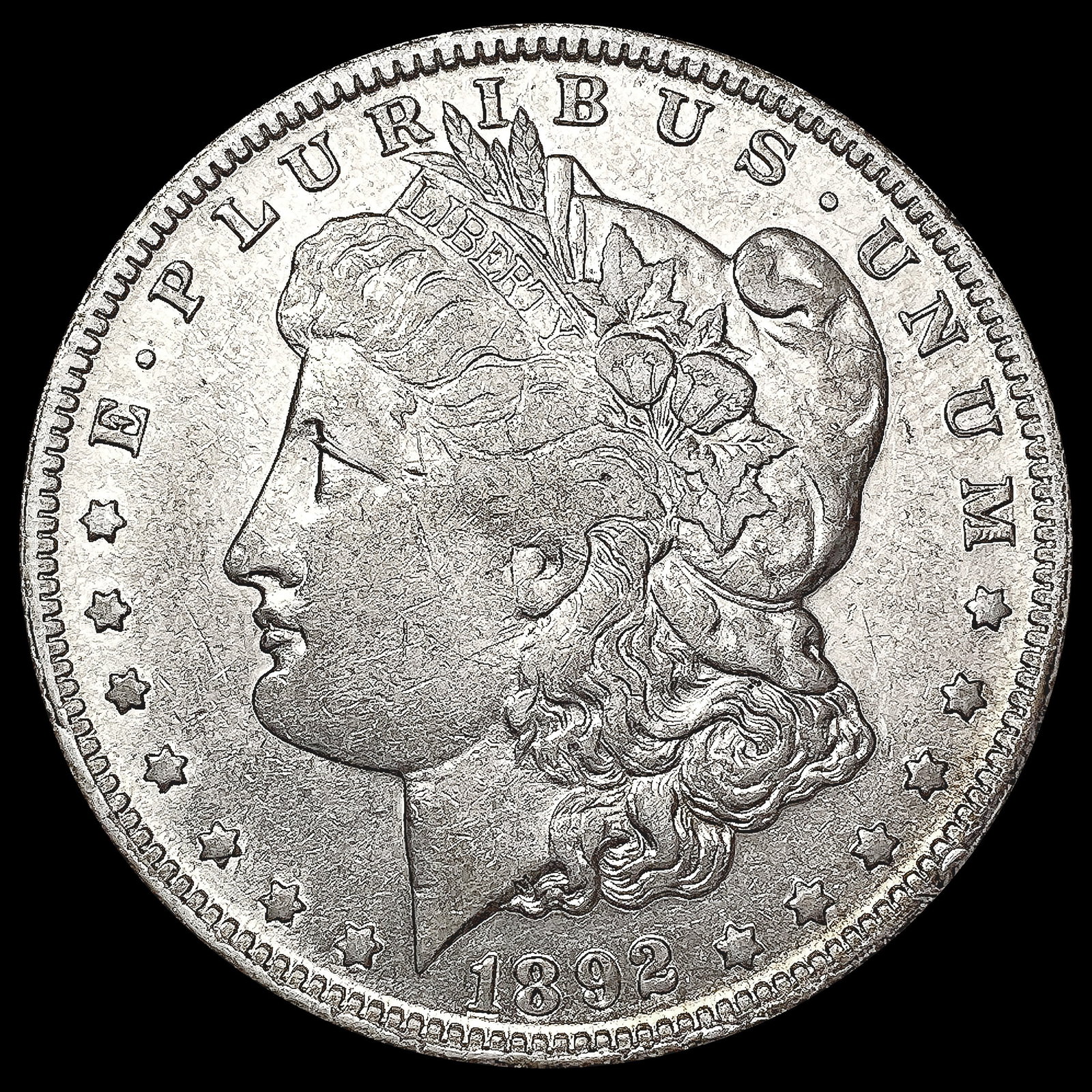 1892-O Morgan Silver Dollar NEARLY UNCIRCULATED (1 of 2)