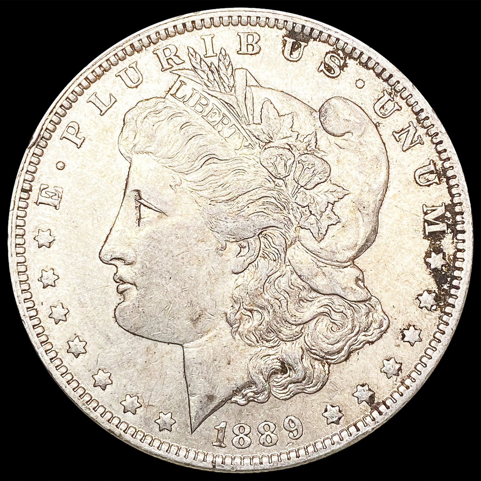 1889-O Morgan Silver Dollar NEARLY UNCIRCULATED (1 of 2)