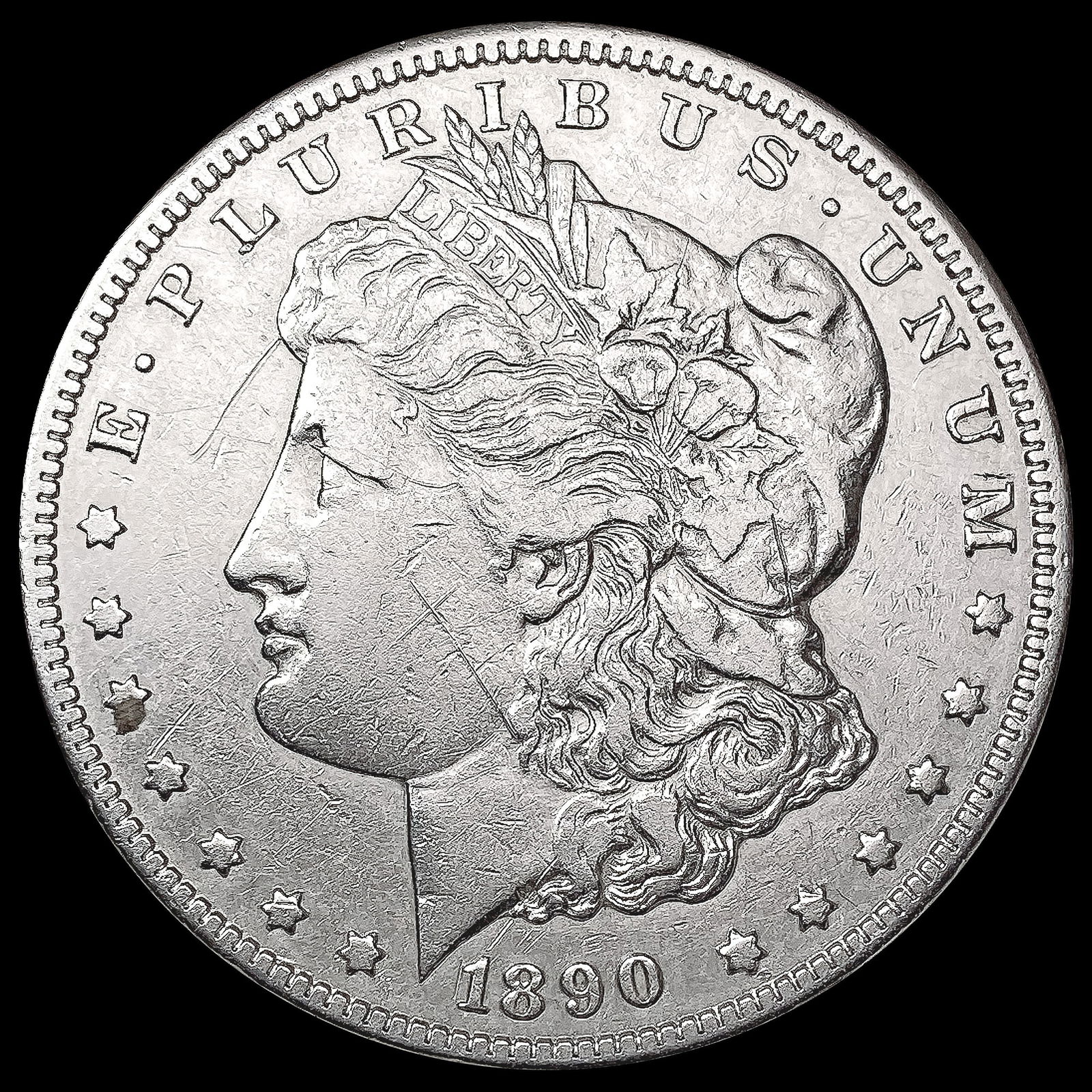 1890-CC Morgan Silver Dollar NEARLY UNCIRCULATED (1 of 2)
