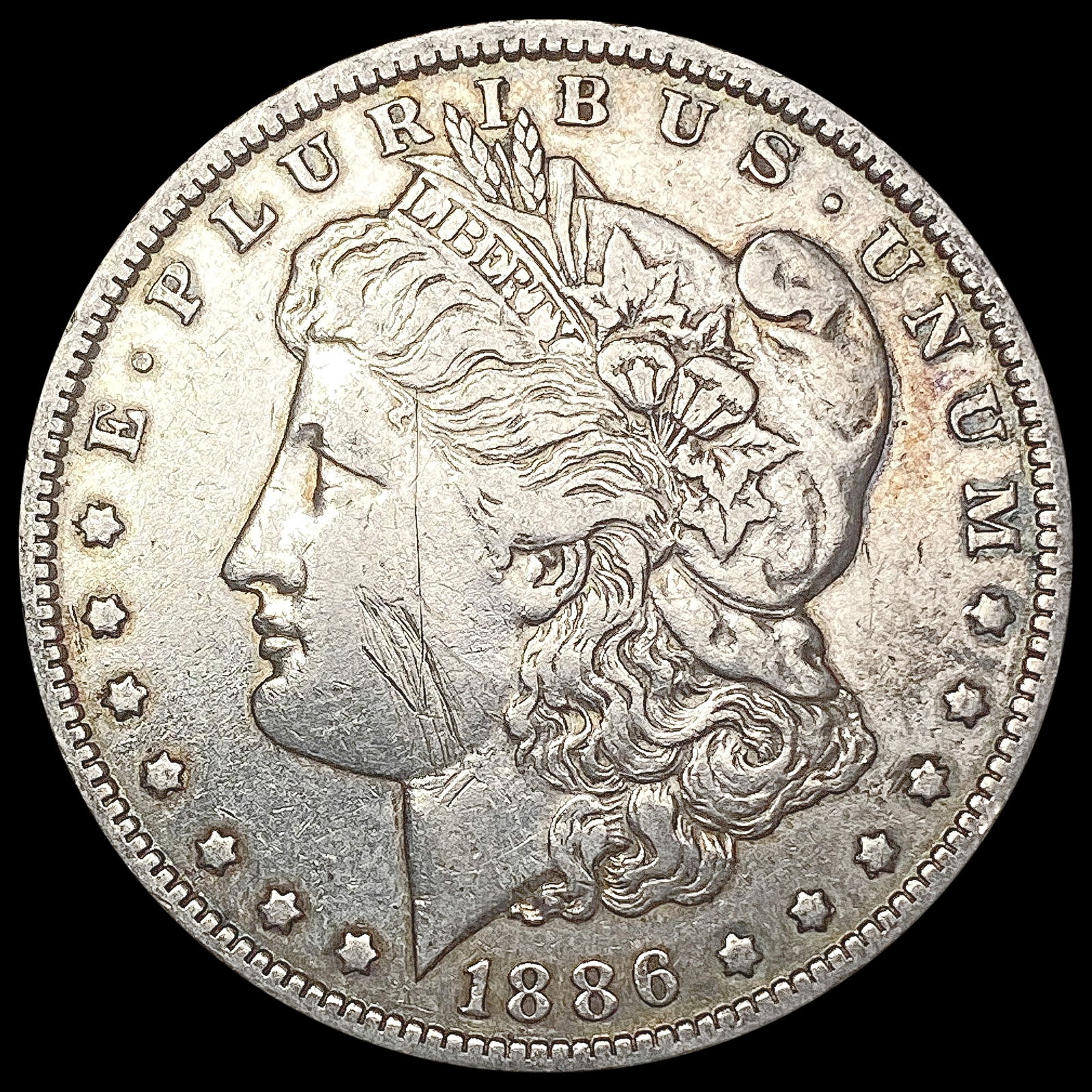 1886-O Morgan Silver Dollar NEARLY UNCIRCULATED (1 of 2)