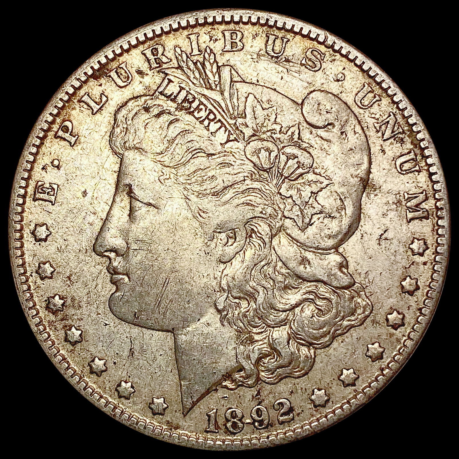 1892-O Morgan Silver Dollar NEARLY UNCIRCULATED (1 of 2)