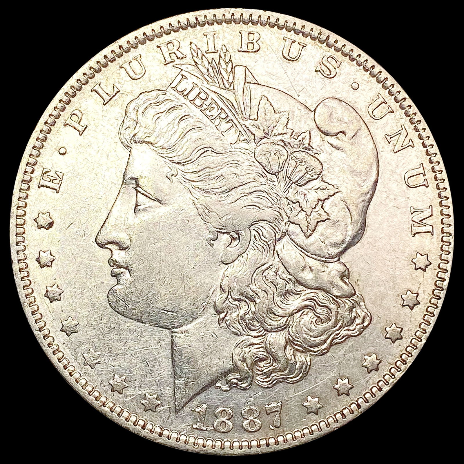 1887-O Morgan Silver Dollar CLOSELY UNCIRCULATED (1 of 2)