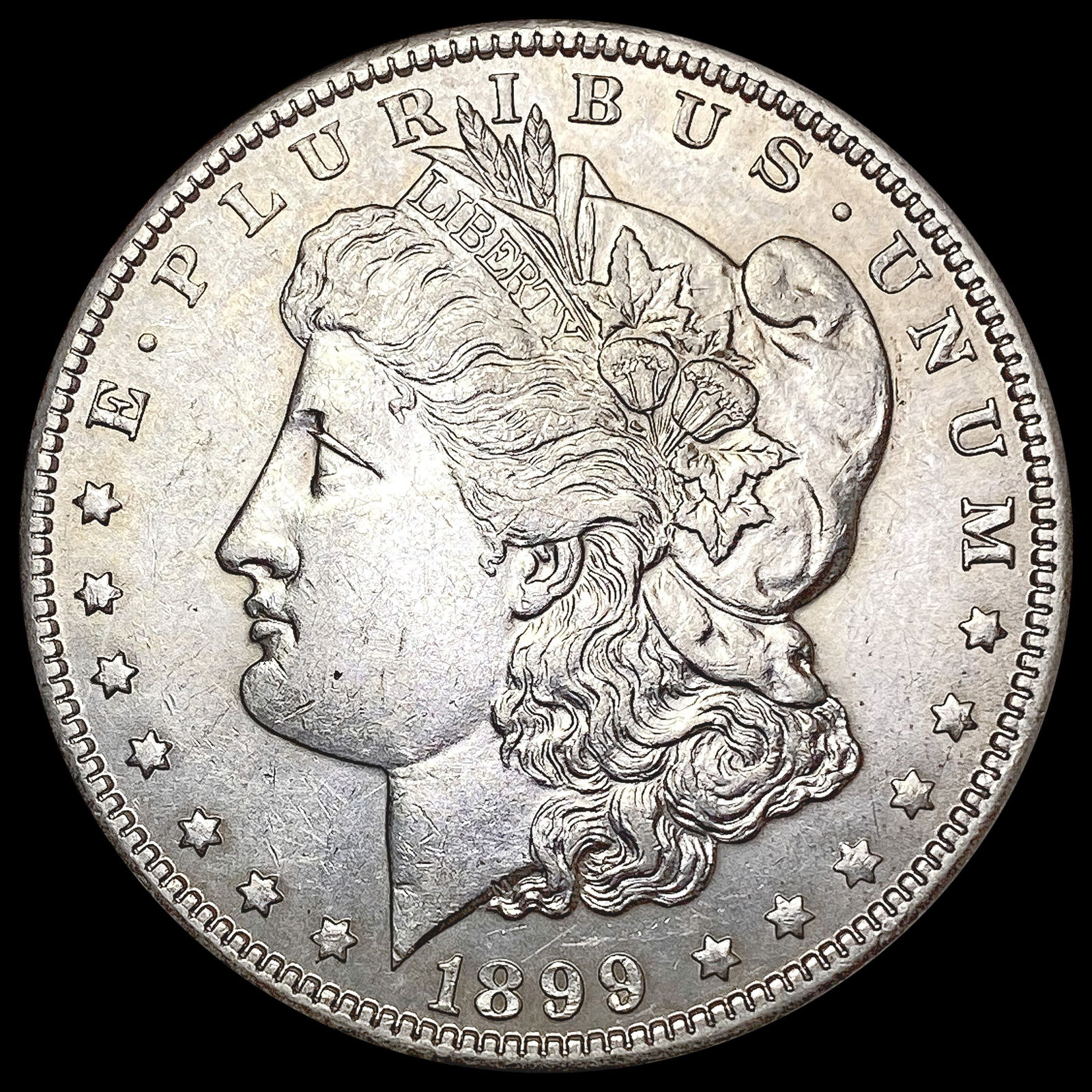 1899-O Morgan Silver Dollar CLOSELY UNCIRCULATED (1 of 2)