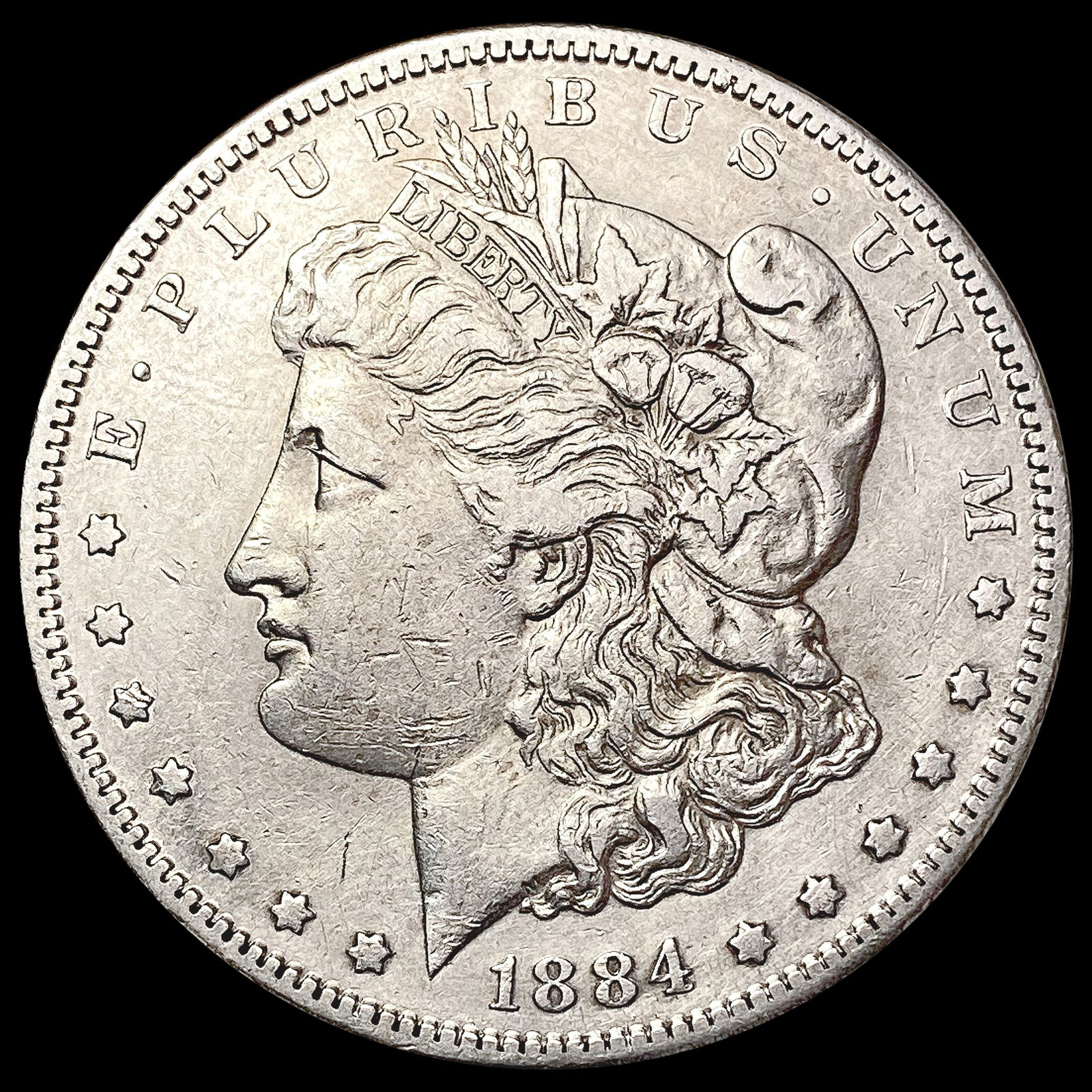 1884-S Morgan Silver Dollar CLOSELY UNCIRCULATED (1 of 2)
