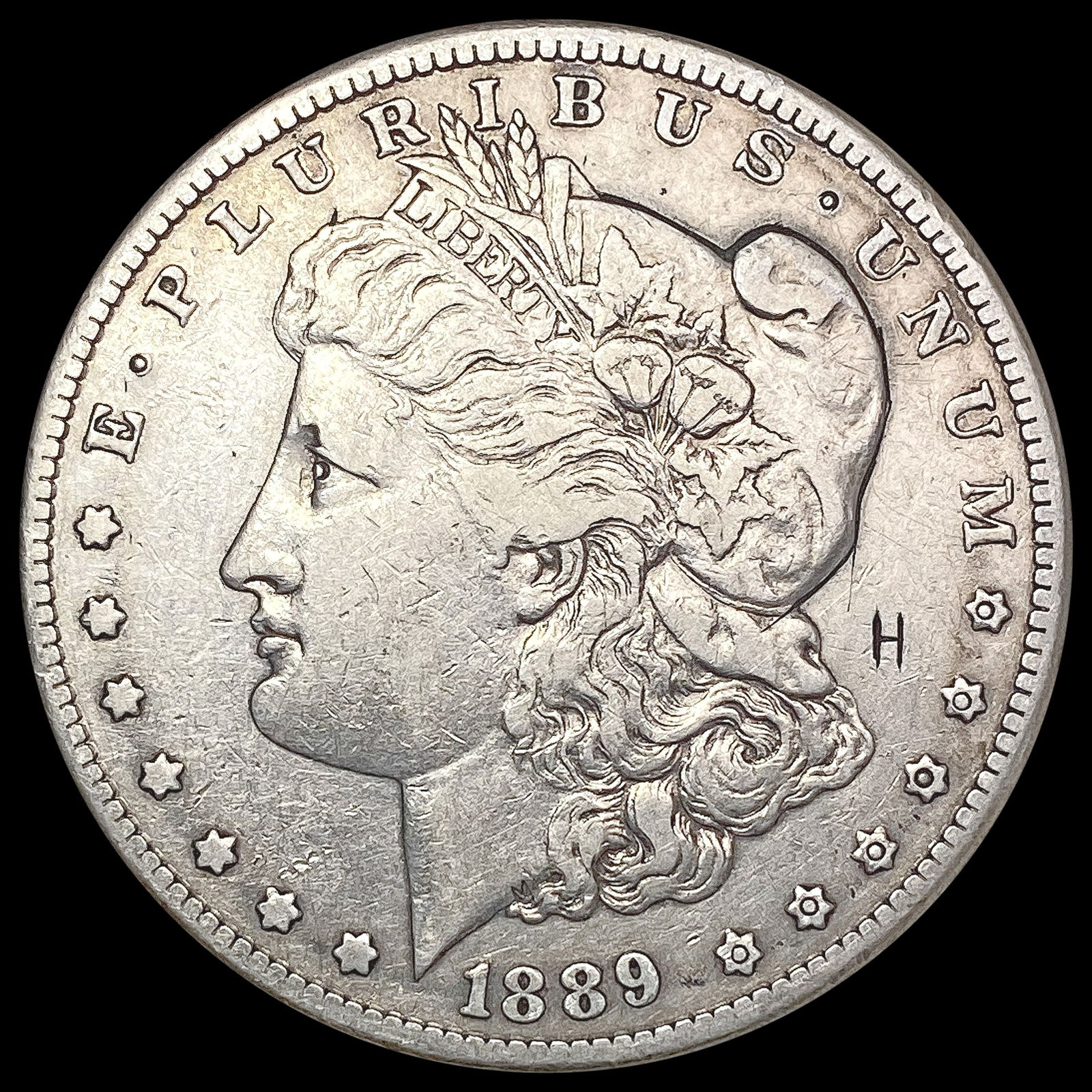 1889-CC Morgan Silver Dollar NEARLY UNCIRCULATED (1 of 2)