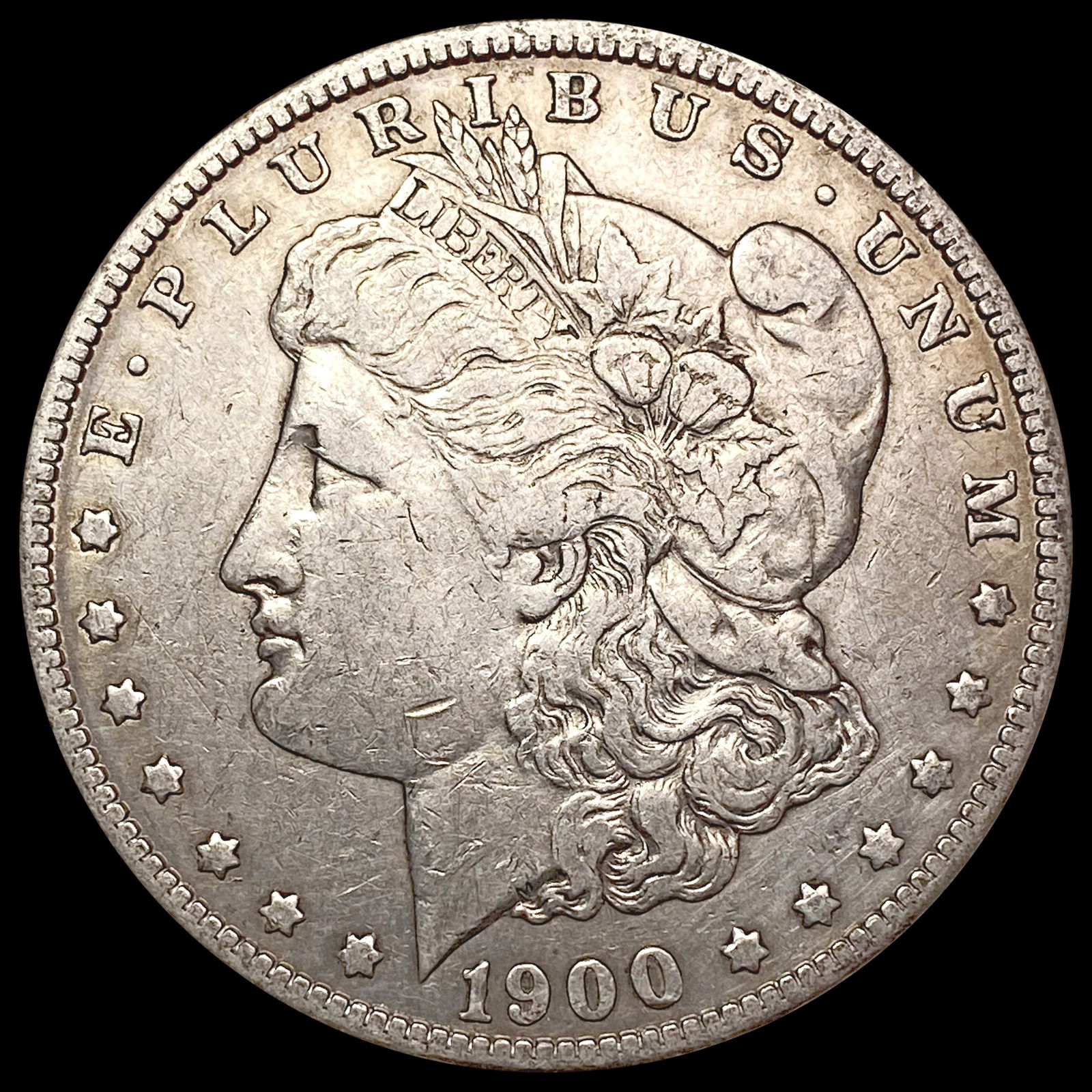1900-O/CC Morgan Silver Dollar CLOSELY UNCIRCULATED (1 of 2)