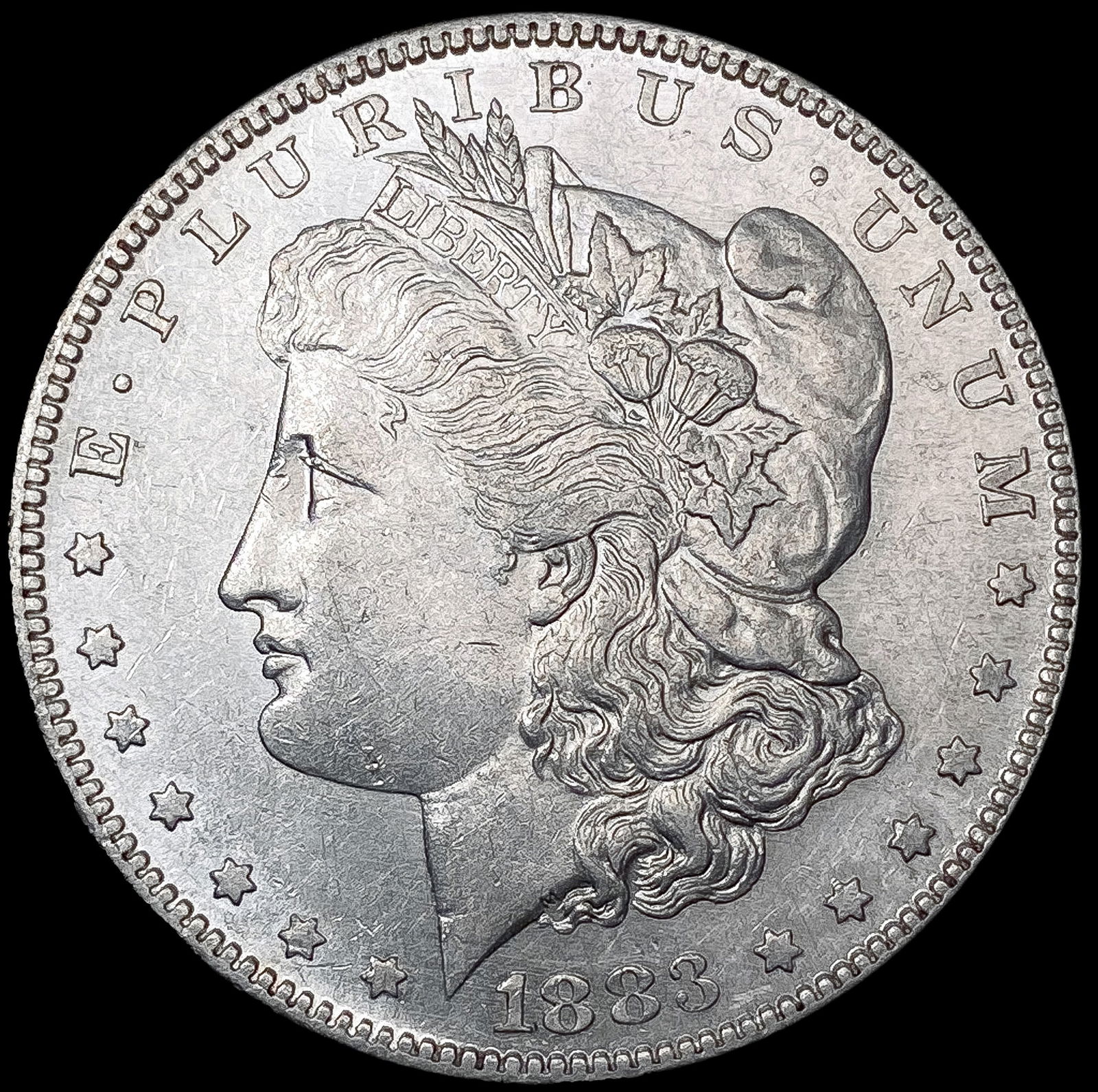 1883-S Morgan Silver Dollar CLOSELY UNCIRCULATED (1 of 2)