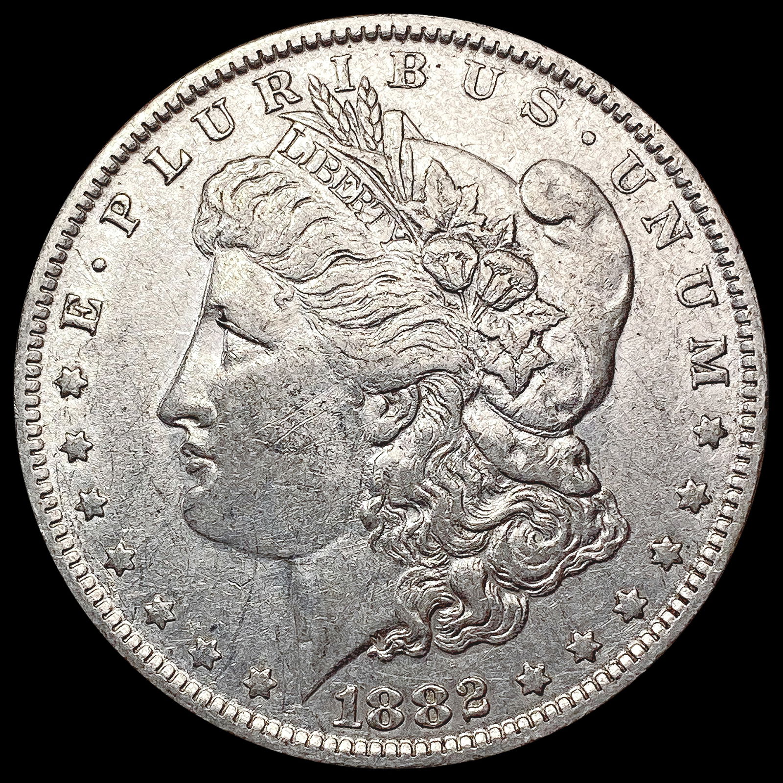 1882-O/S Morgan Silver Dollar CLOSELY UNCIRCULATED (1 of 2)