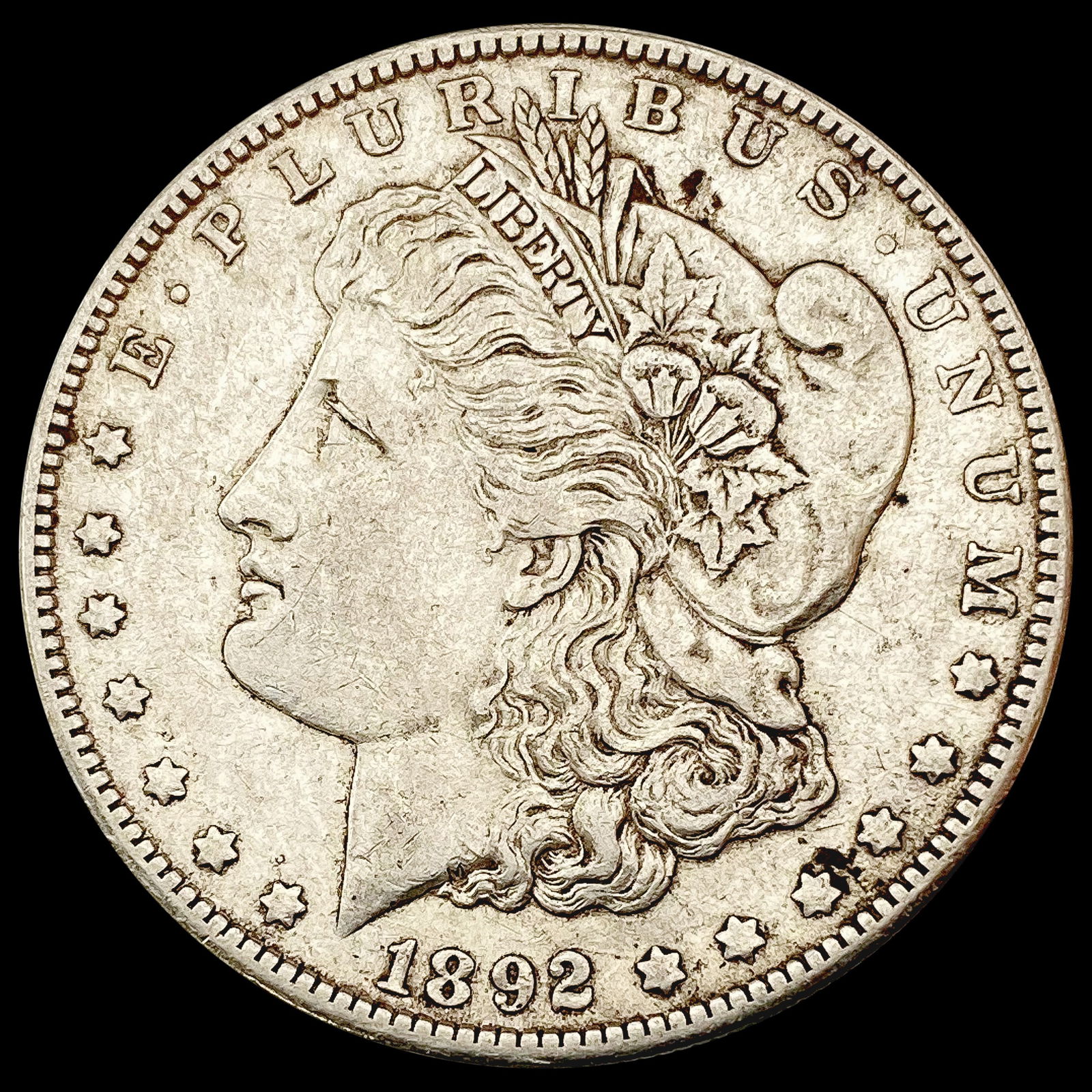 1892-O Morgan Silver Dollar NEARLY UNCIRCULATED (1 of 2)