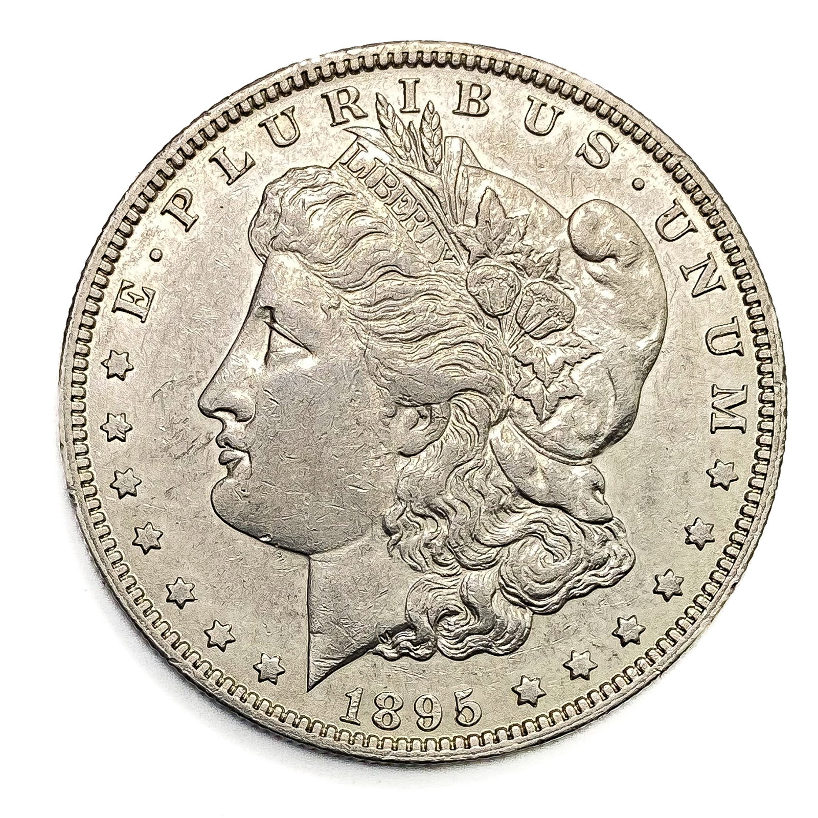 1895-O Morgan Silver Dollar AU+ (1 of 2)