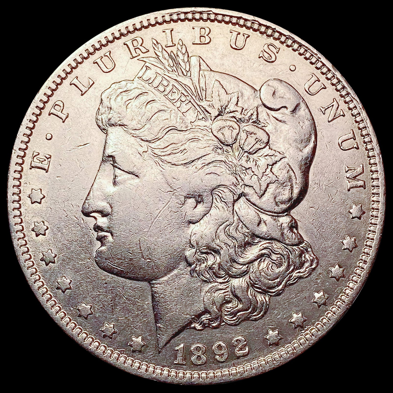 1892-O Morgan Silver Dollar NEARLY UNCIRCULATED (1 of 2)