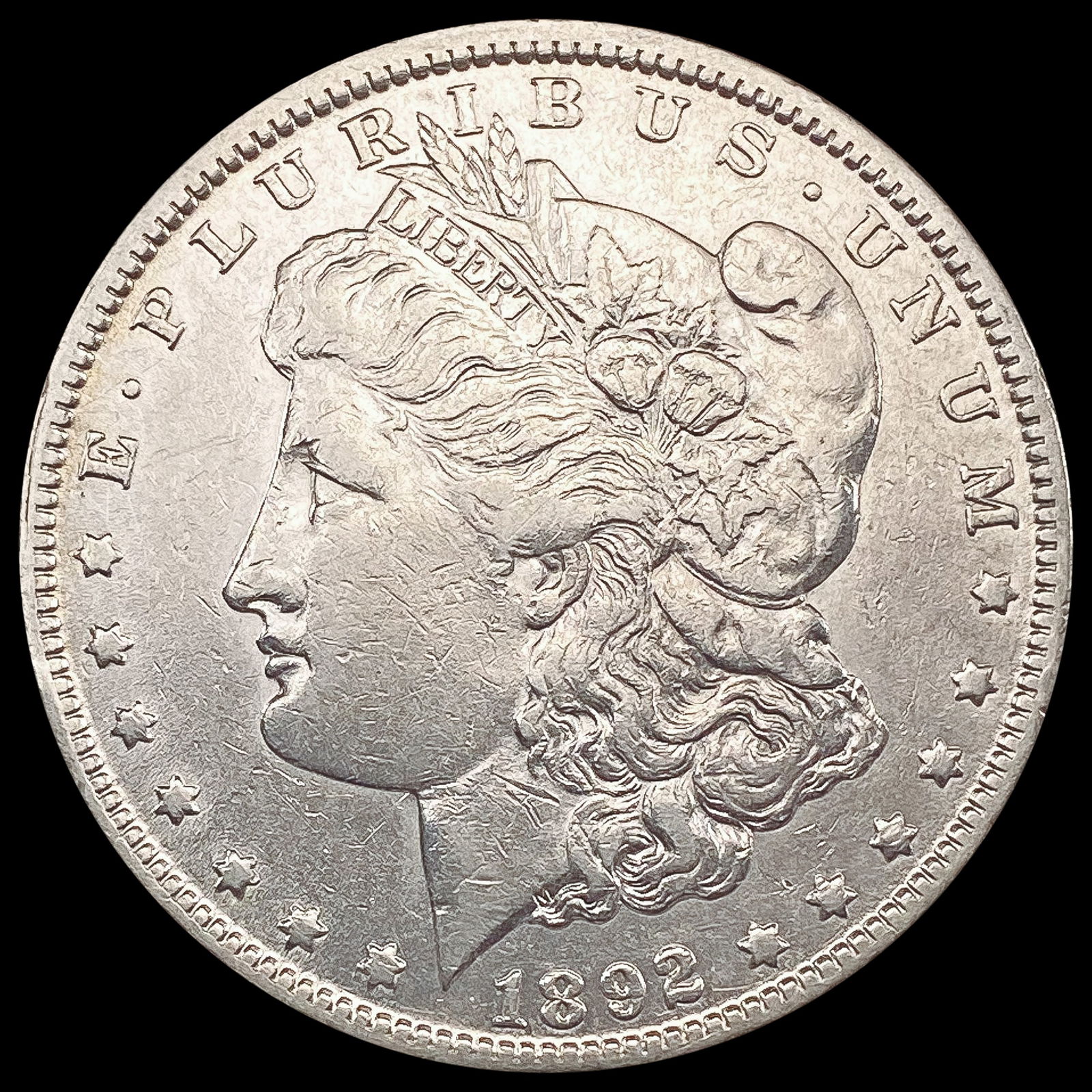 1892-O Morgan Silver Dollar CLOSELY UNCIRCULATED (1 of 2)