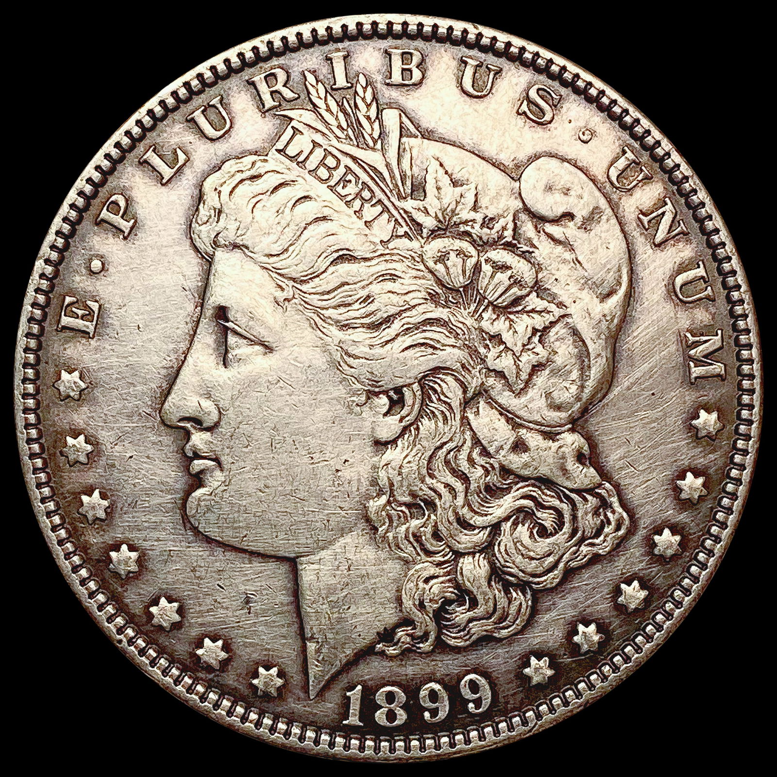 1899 Morgan Silver Dollar CLOSELY UNCIRCULATED (1 of 2)