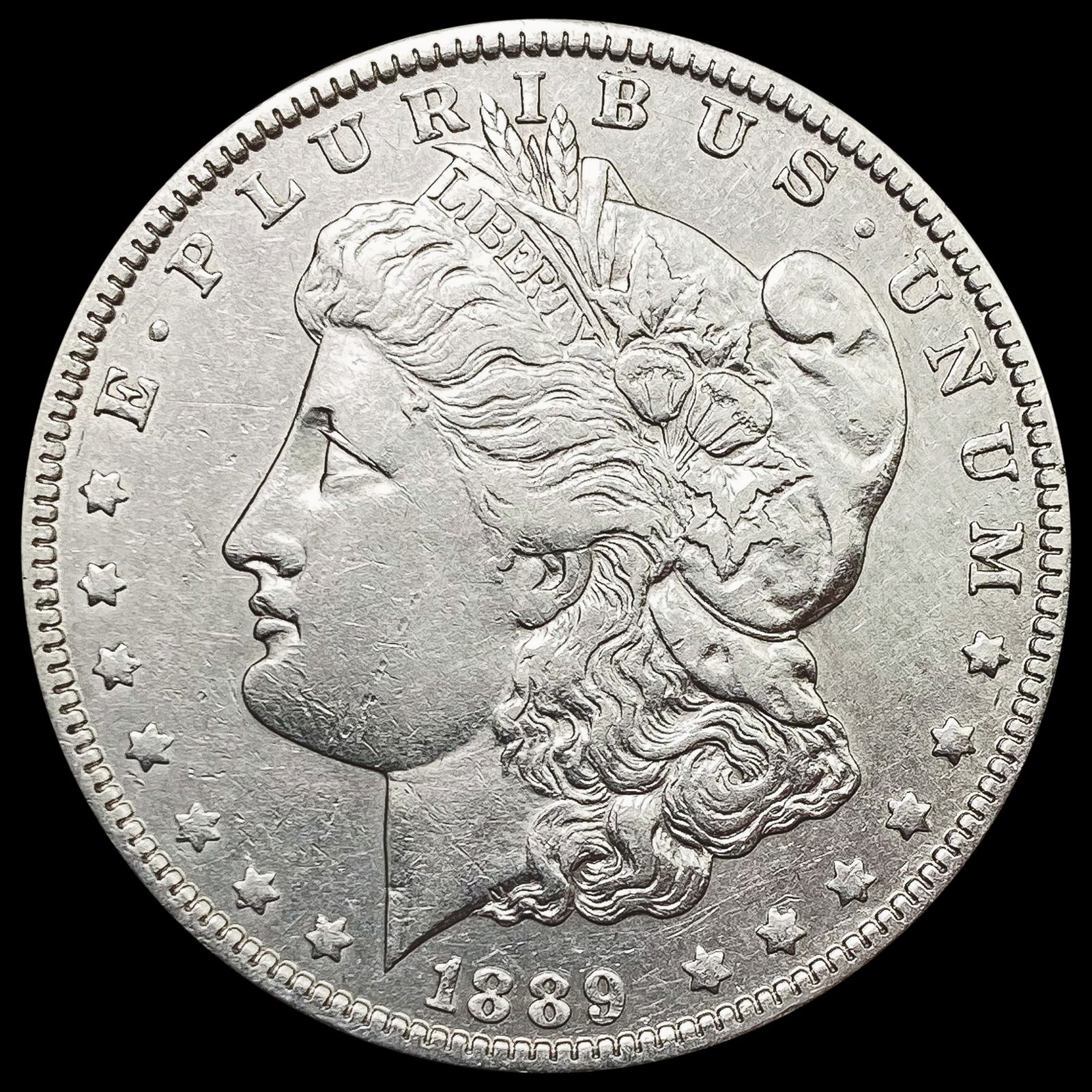 1889-O Morgan Silver Dollar CLOSELY UNC (1 of 2)