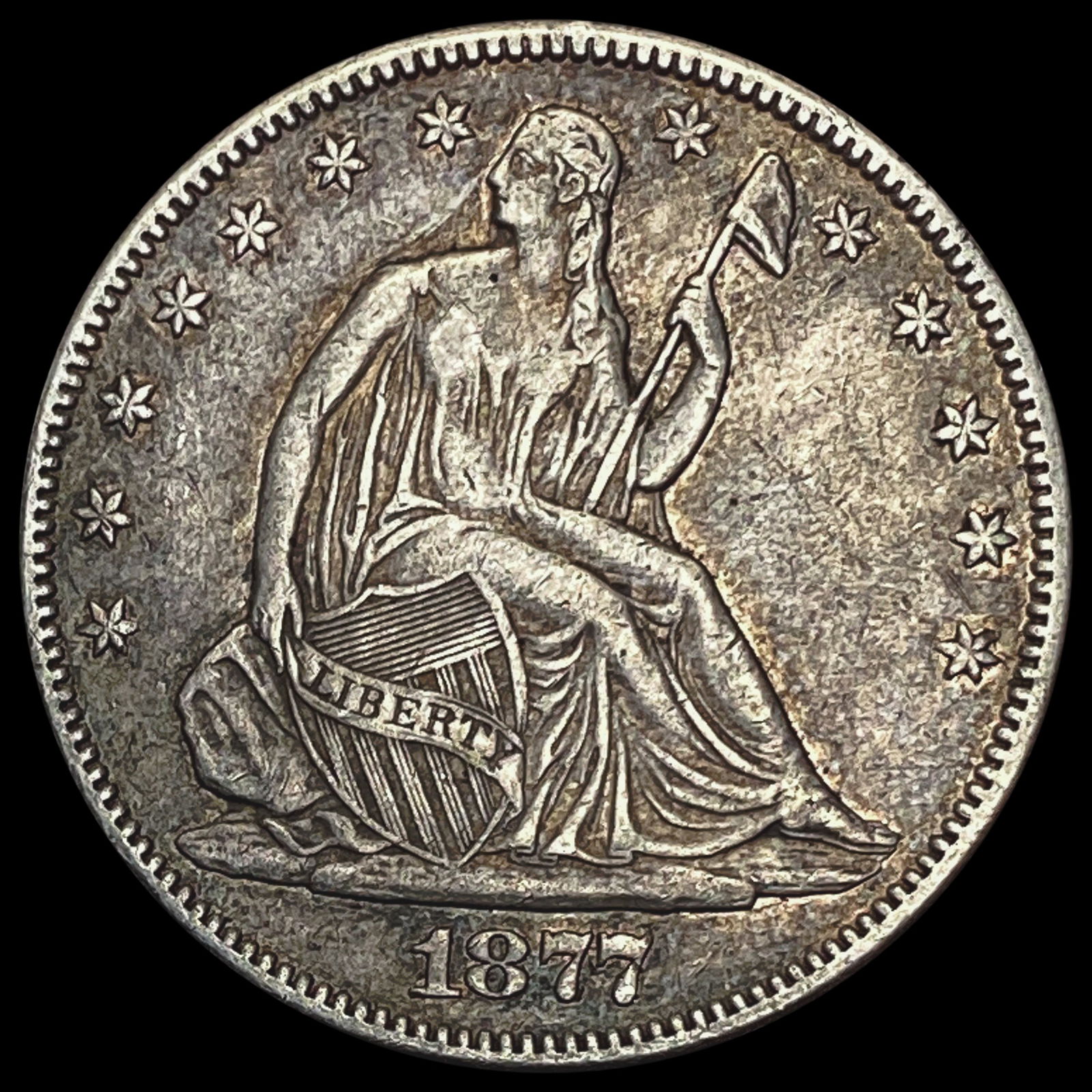 1877 Seated Liberty Half Dollar NEARLY UNCIRCULATED (1 of 2)