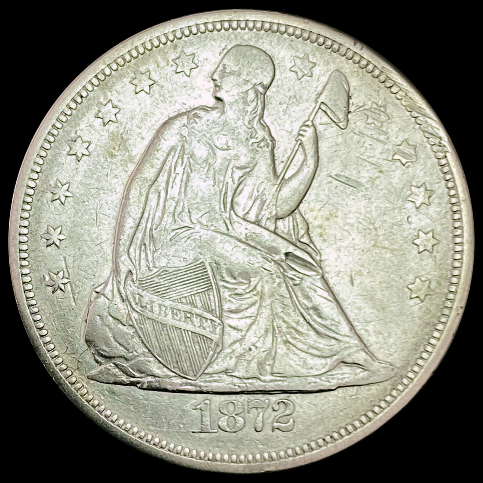 1872 Seated Liberty Dollar NEARLY UNCIRCULATED (1 of 2)