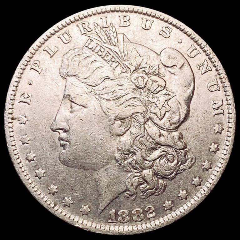 1882-O/S Morgan Silver Dollar NEARLY UNCIRCULATED (1 of 2)