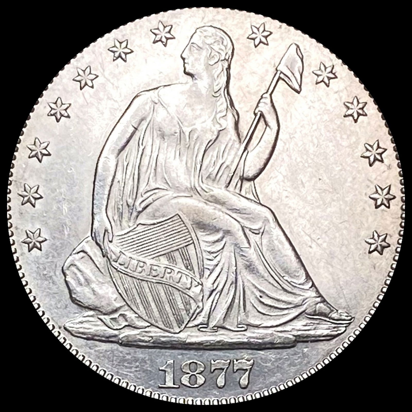 CLOSELY UNCIRCULATED 1877 Seated Liberty Half Dollar (1 of 2)