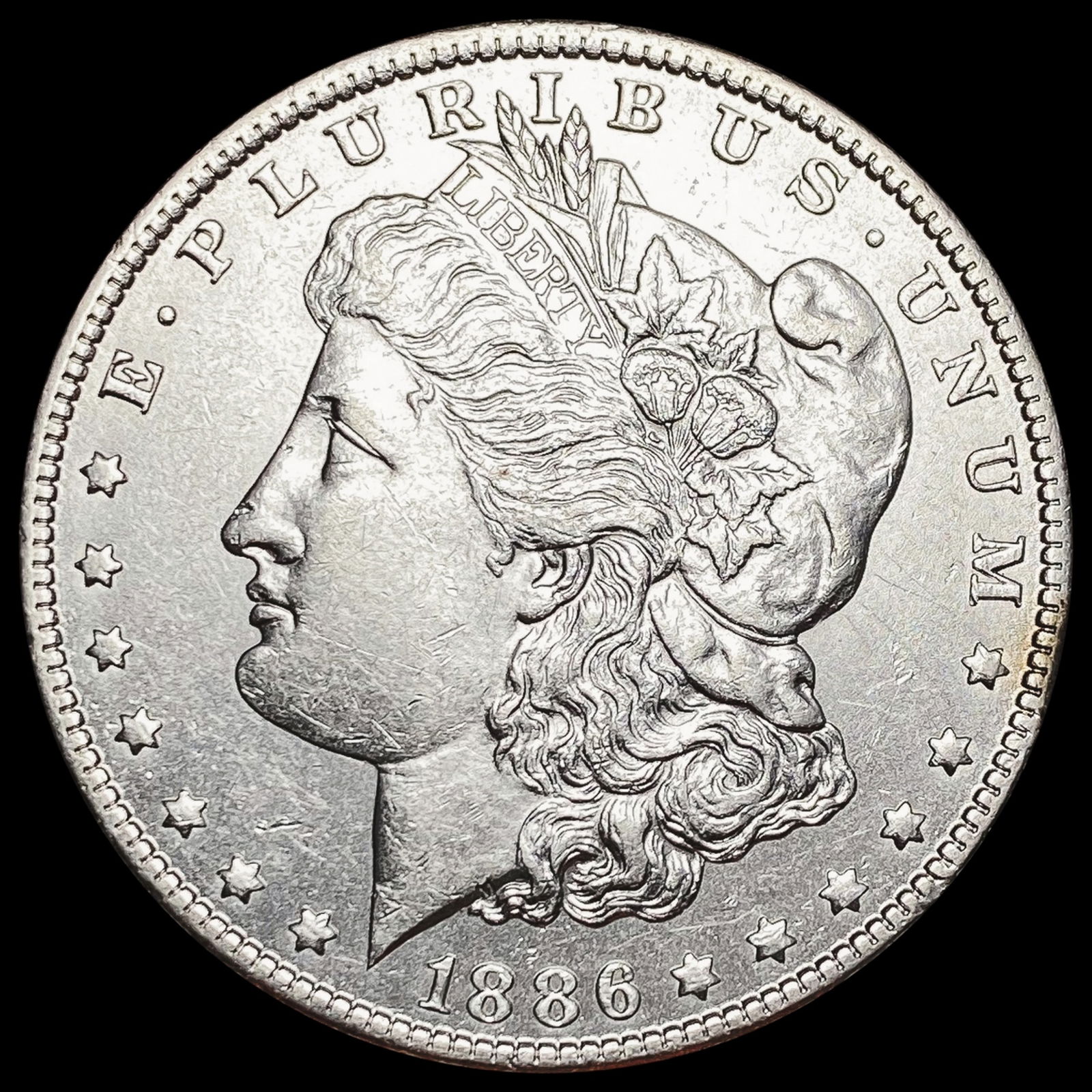 1886-O Morgan Silver Dollar UNC (1 of 2)