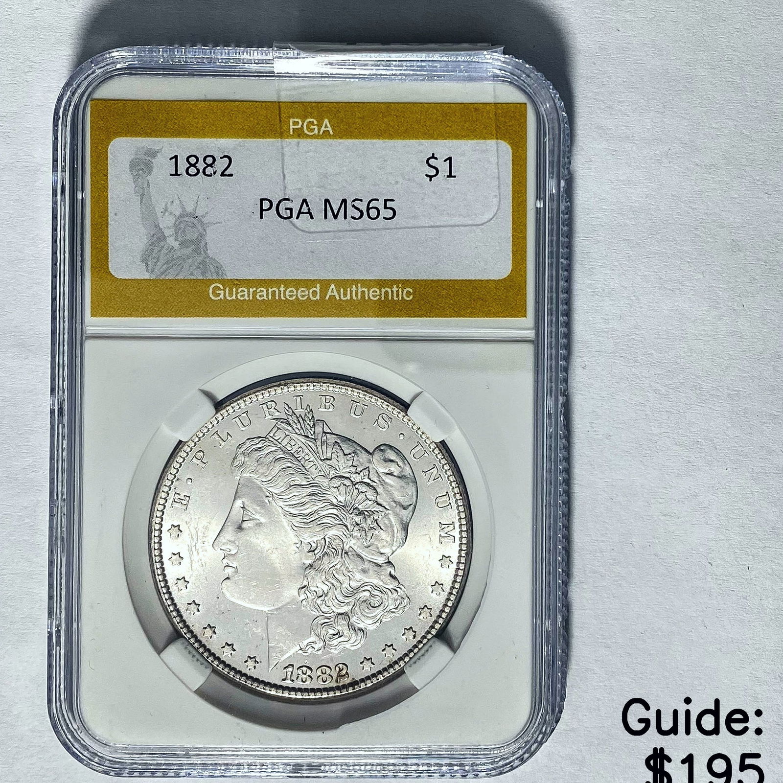 1882 Morgan Dollar PGA MS65 SILVER (1 of 2)