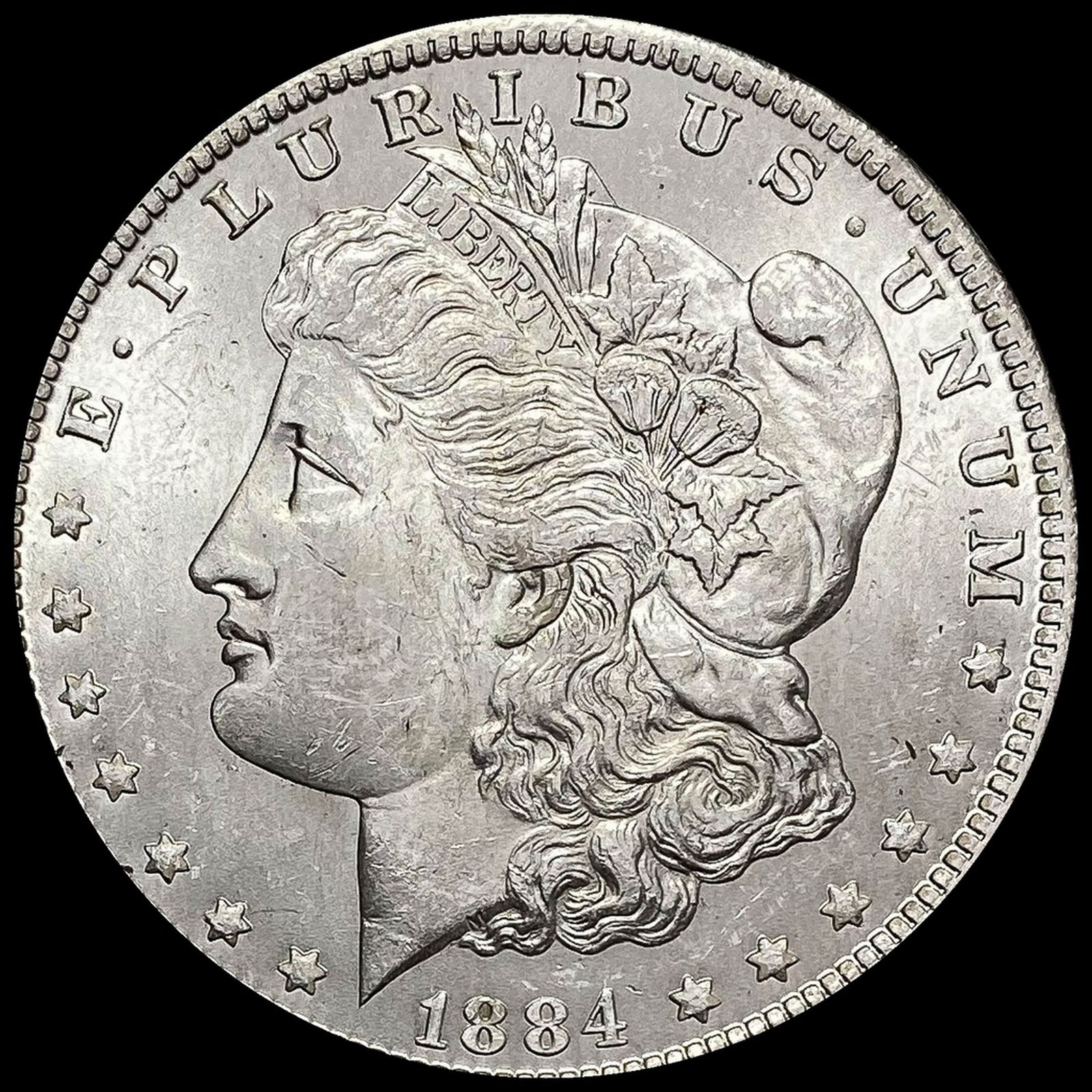 1884-O Morgan Silver Dollar UNC (1 of 2)
